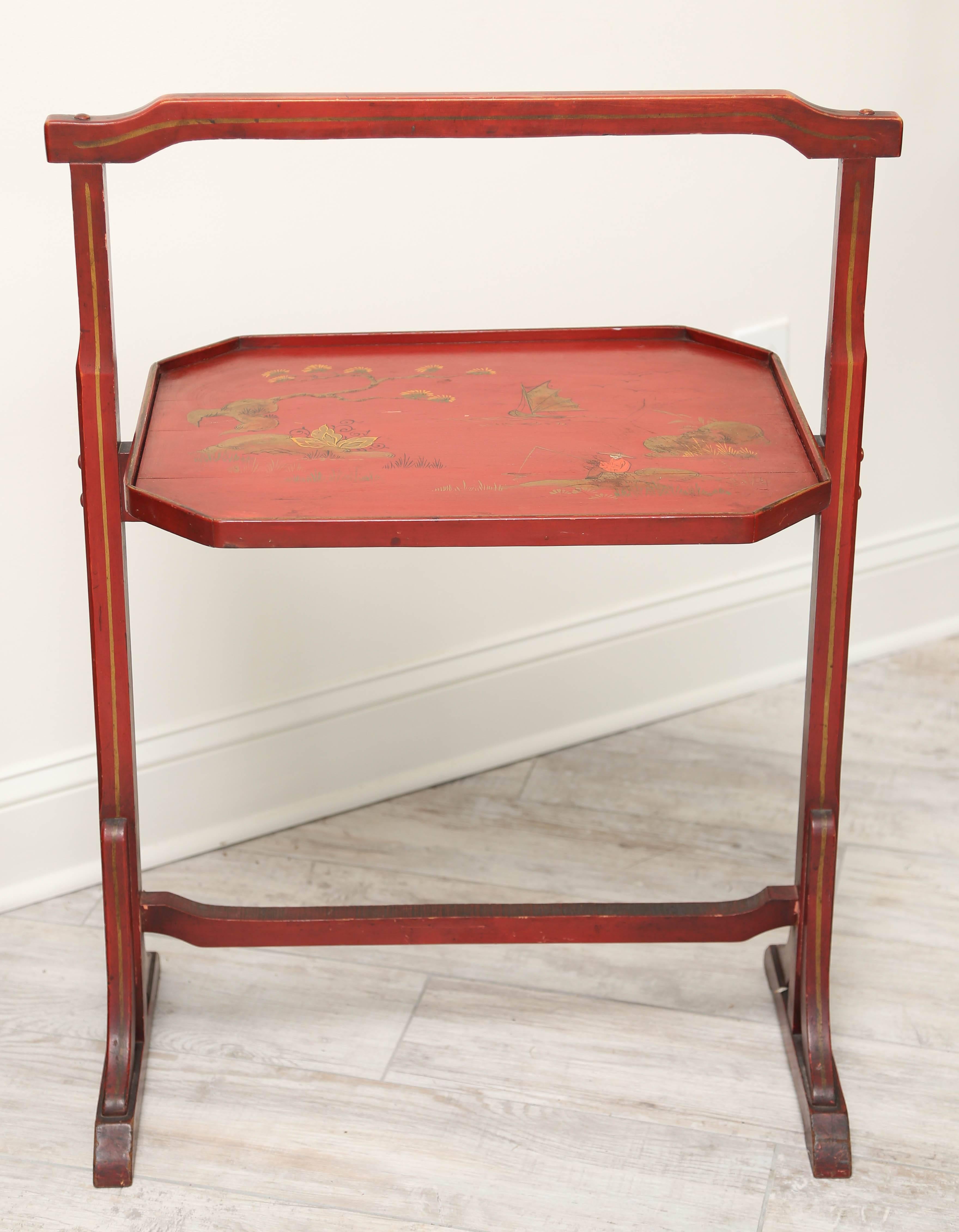 Charming oriental style folding tea tray table finished in a lovely Chinese red.