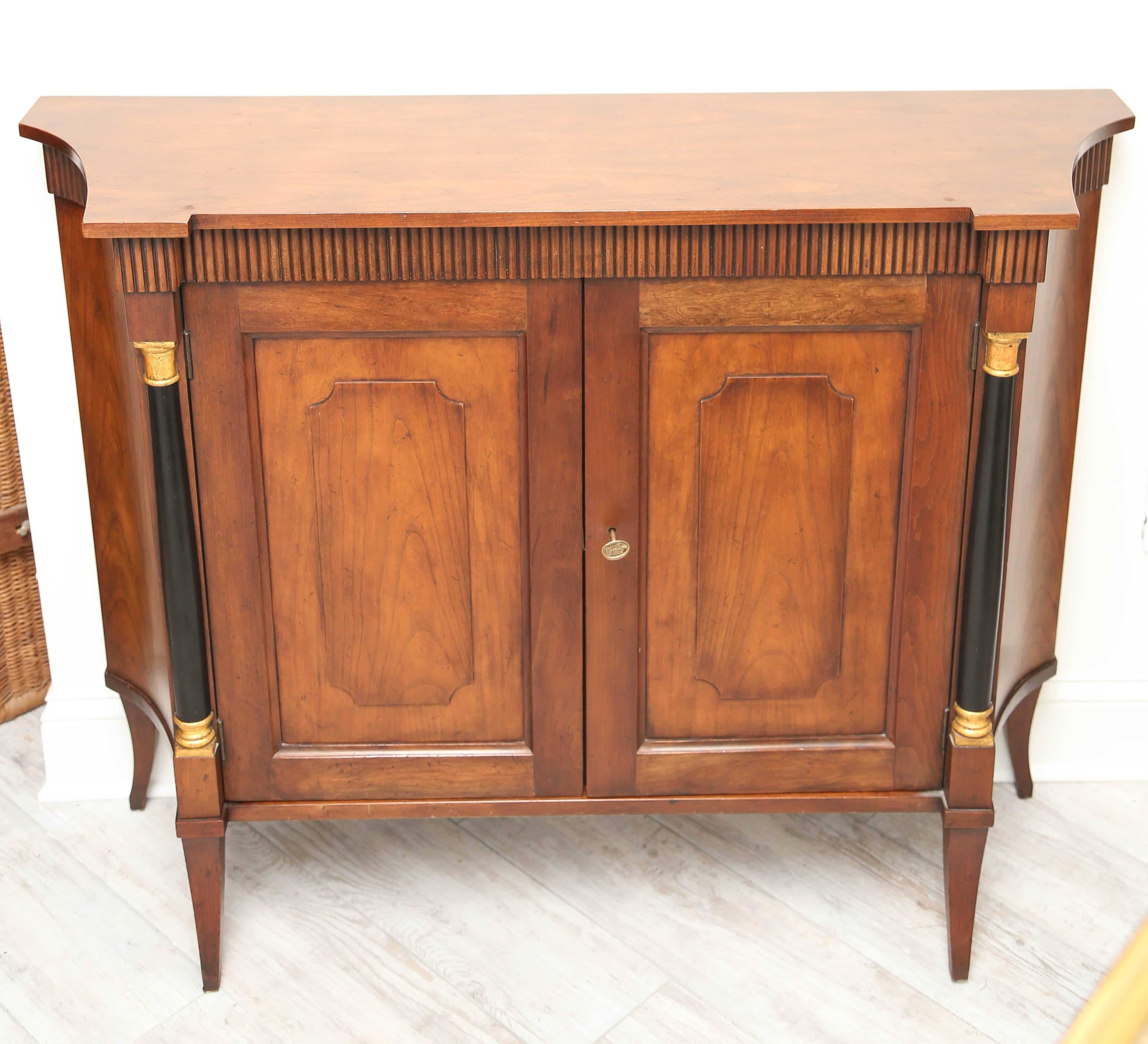 Classical two-door buffet or cabinet with interior shelves in the Biedermeier style by Baker Furniture Co.
