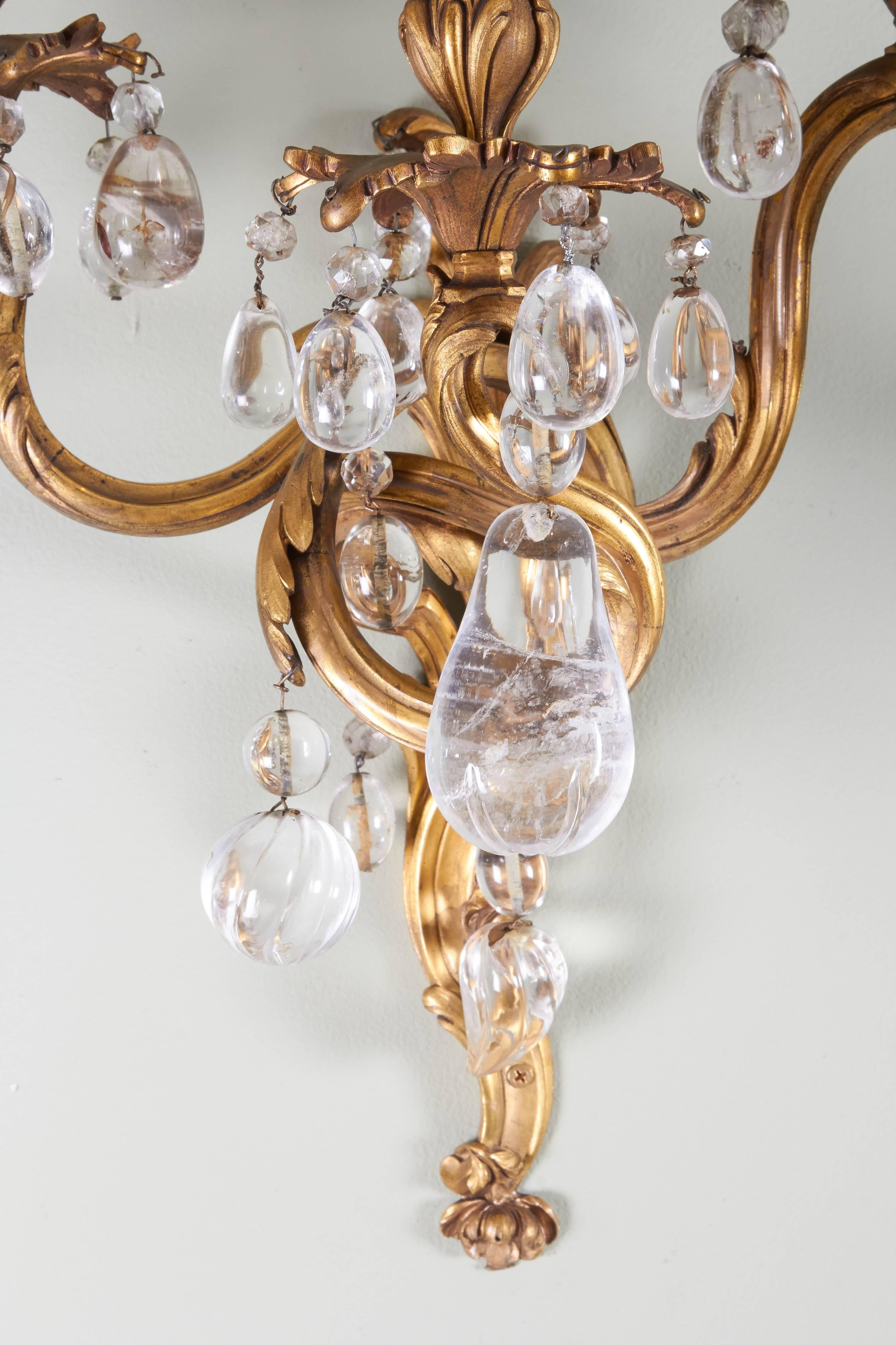 French A Pair of Louis XV Style Bronze Dore and Rock Crystal Sconces  For Sale