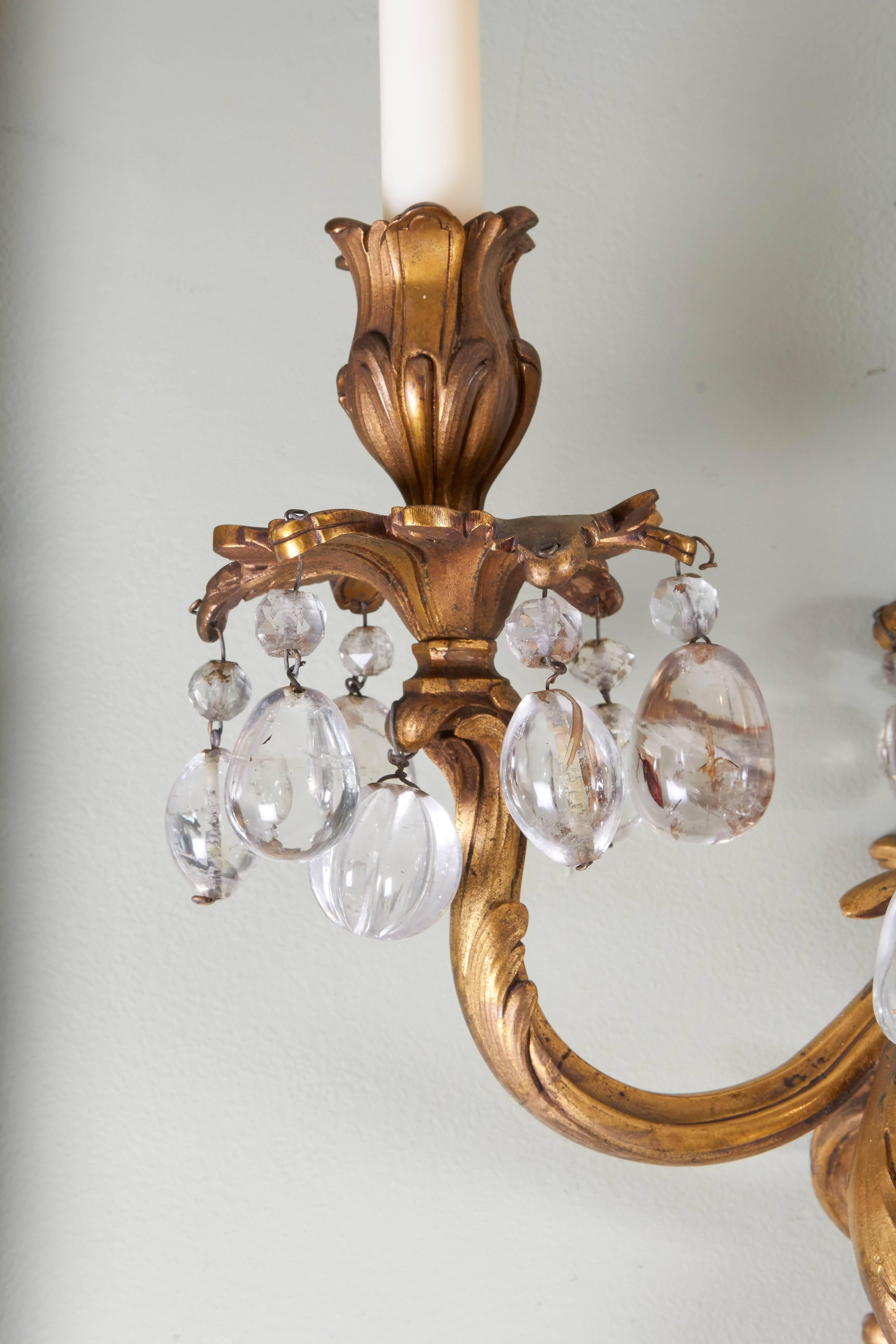 Gilt A Pair of Louis XV Style Bronze Dore and Rock Crystal Sconces  For Sale