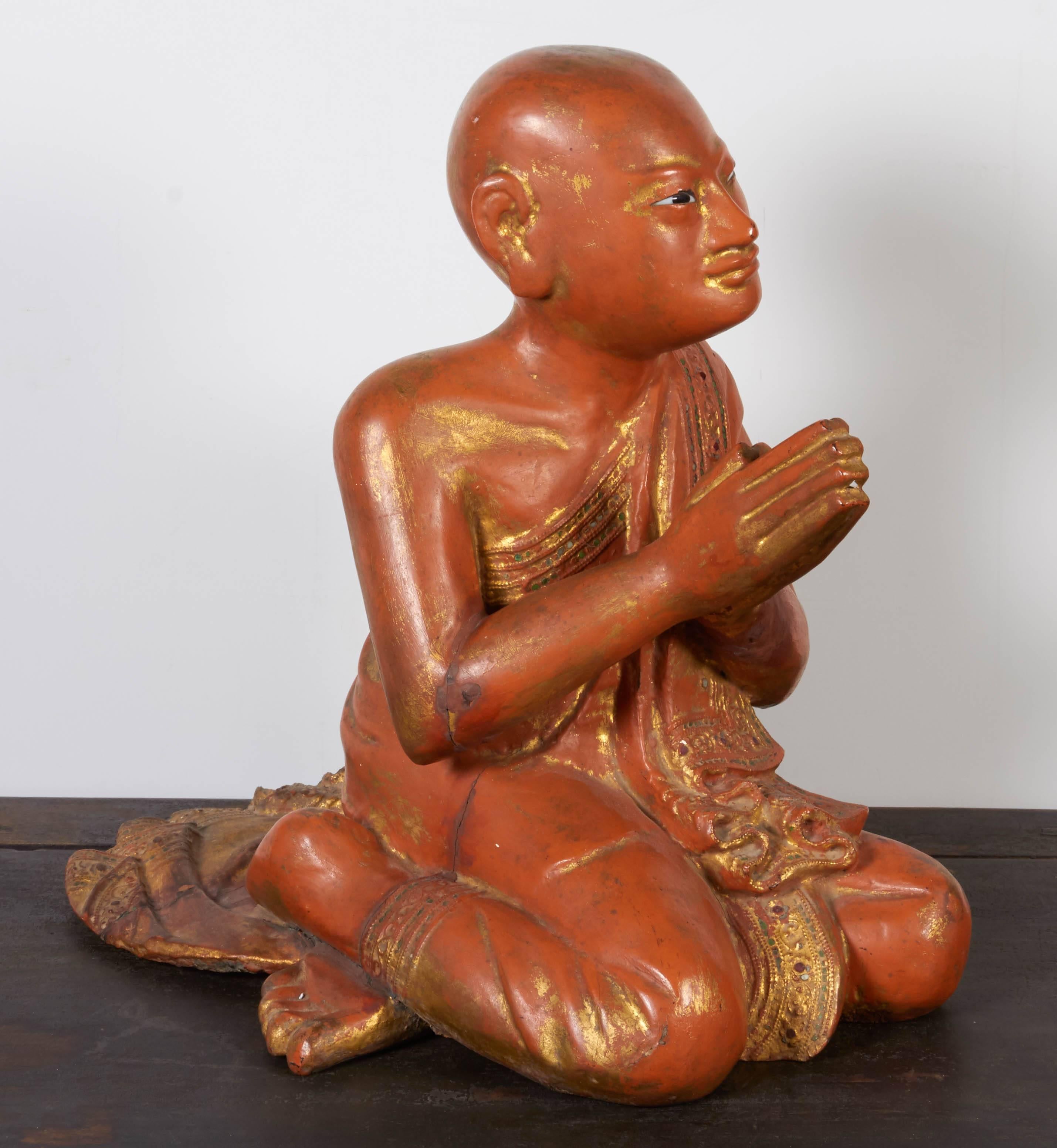 A wonderfully serene and peaceful antique Burmese monk in the Classic praying position. A sweet smile and kind eyes looking upward complete this piece.
BH557.
