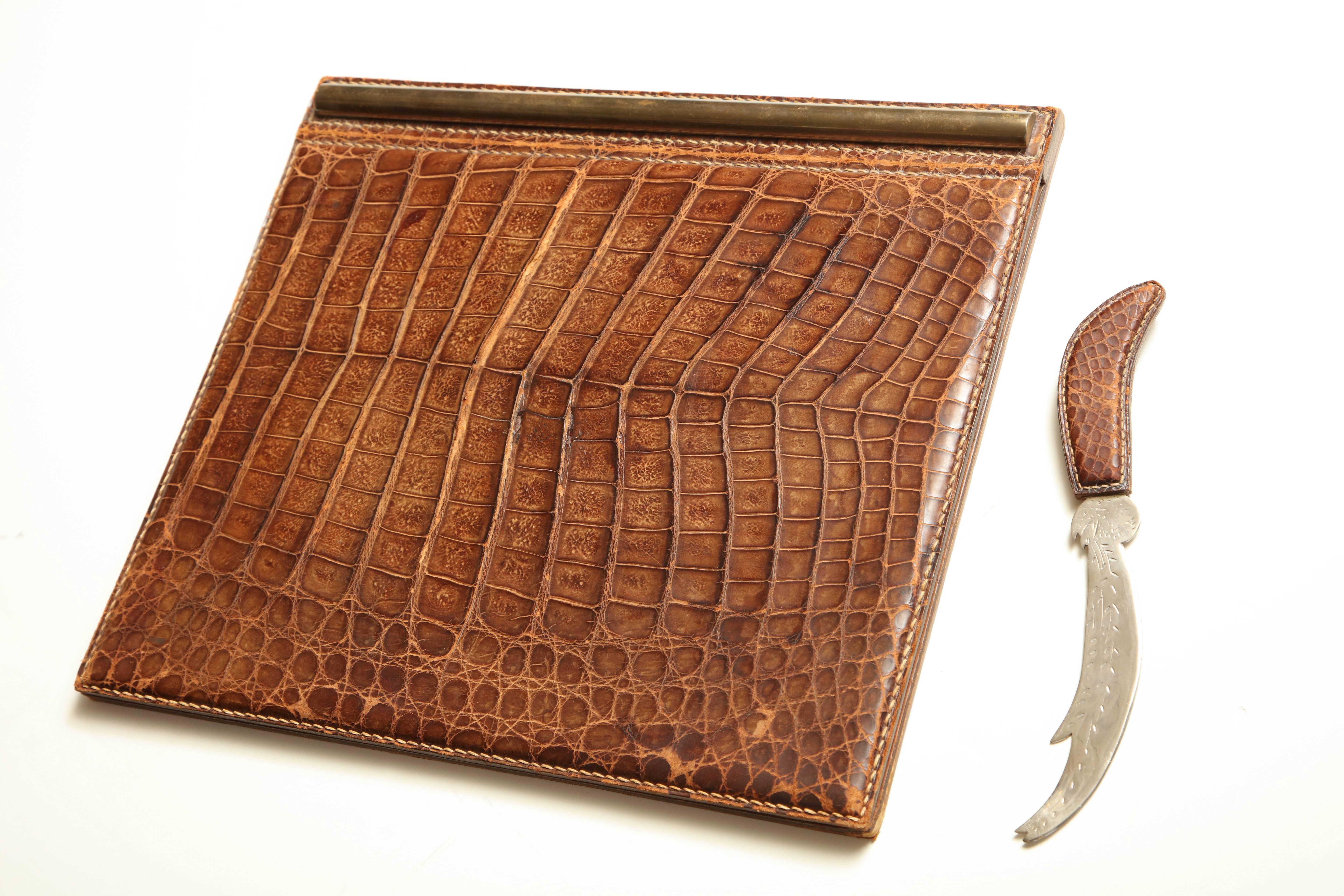 Folding desk blotter and letter opener in alligator by Mittaldi of Buenes Aires.