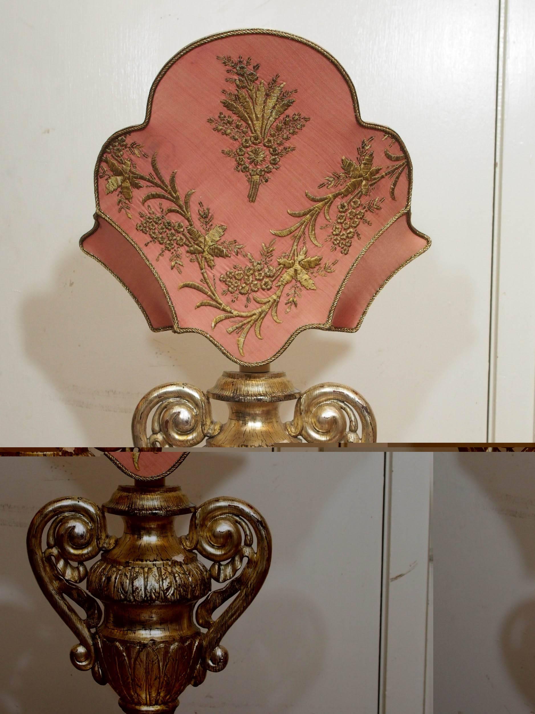 Pair of Italian 19th century gilt urns with custom silk shades with appliqué of gilt thread work from 18th century priest vestments.