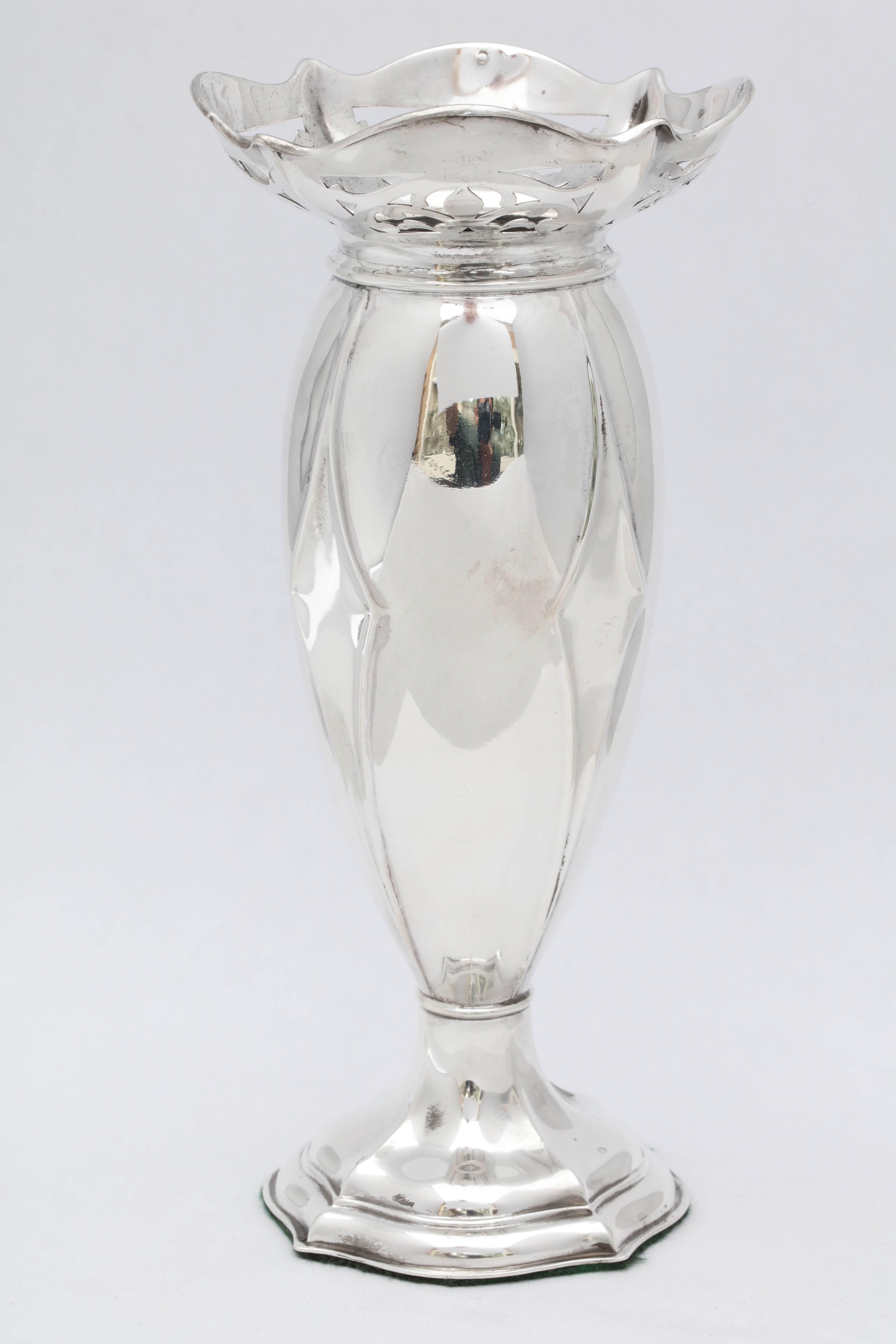 Sterling silver, Art Deco period vase, Birmingham, England, Alexander Clark and Co., Ltd. Has a French import mark also. A little less than 7 3/4 inches high x 3 1/2 inches diameter across top x 3 inches diameter across weighted base. Pierced design