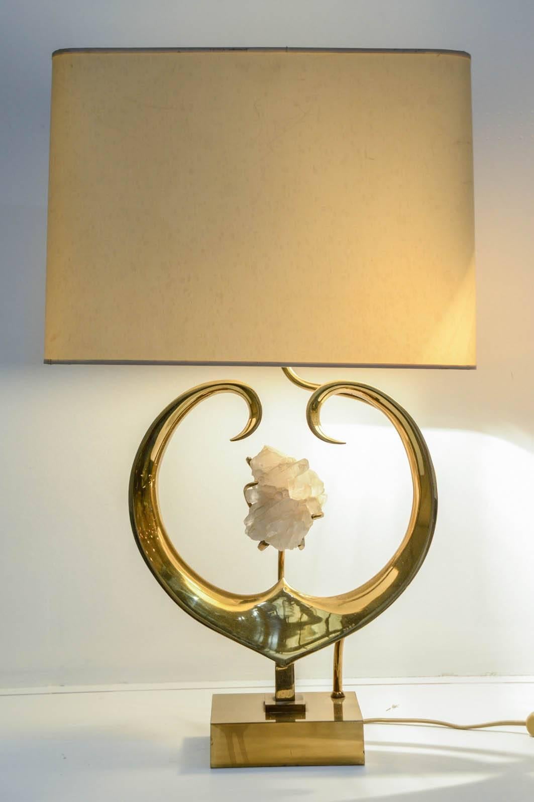 Sculptural polished bronze lamp with quartz.
Shade is not provided,
Dimensions given without shade
Shade: 25 x 40 x 30
Signed.