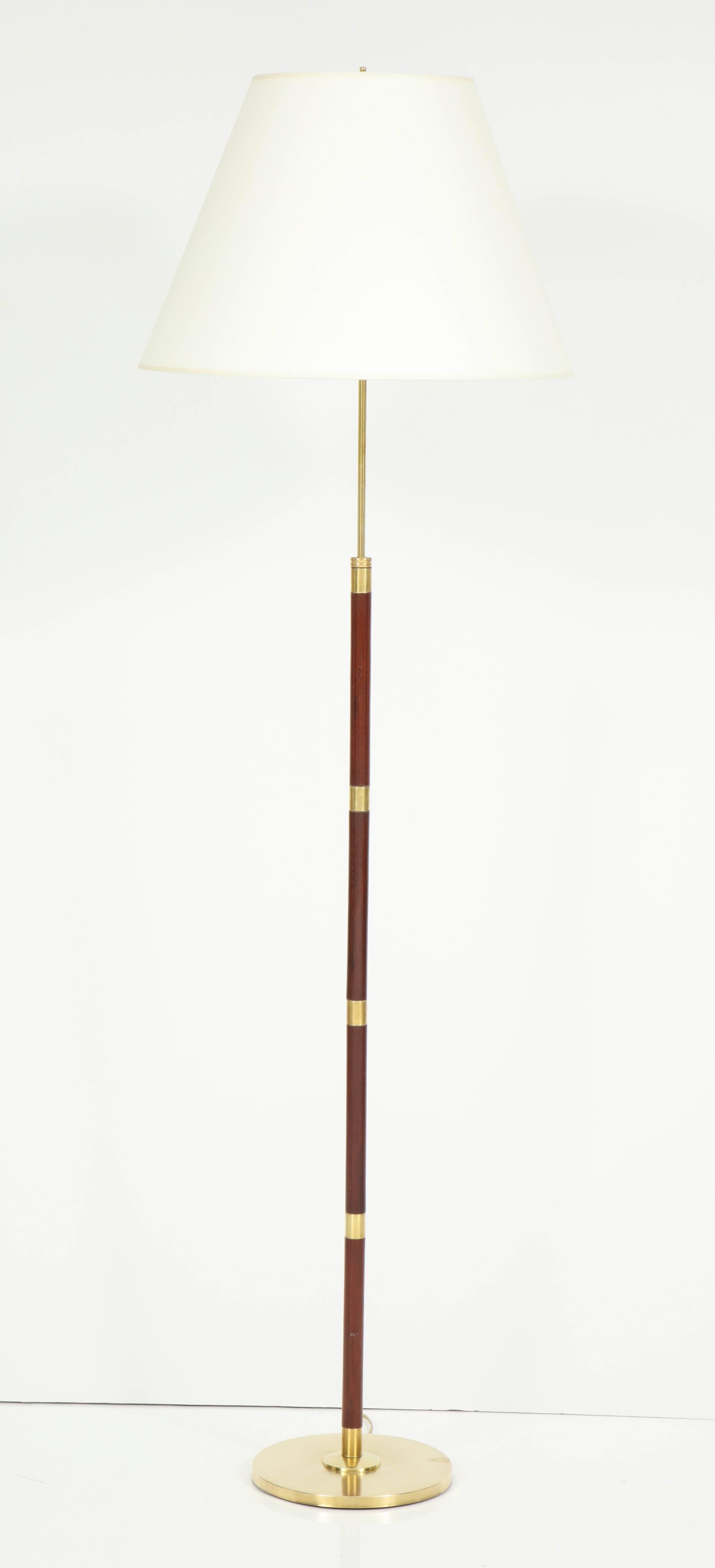 Danish rosewood and brass floor lamp by Fog & Mørup, circa 1960s Restored and rewired for the US.
