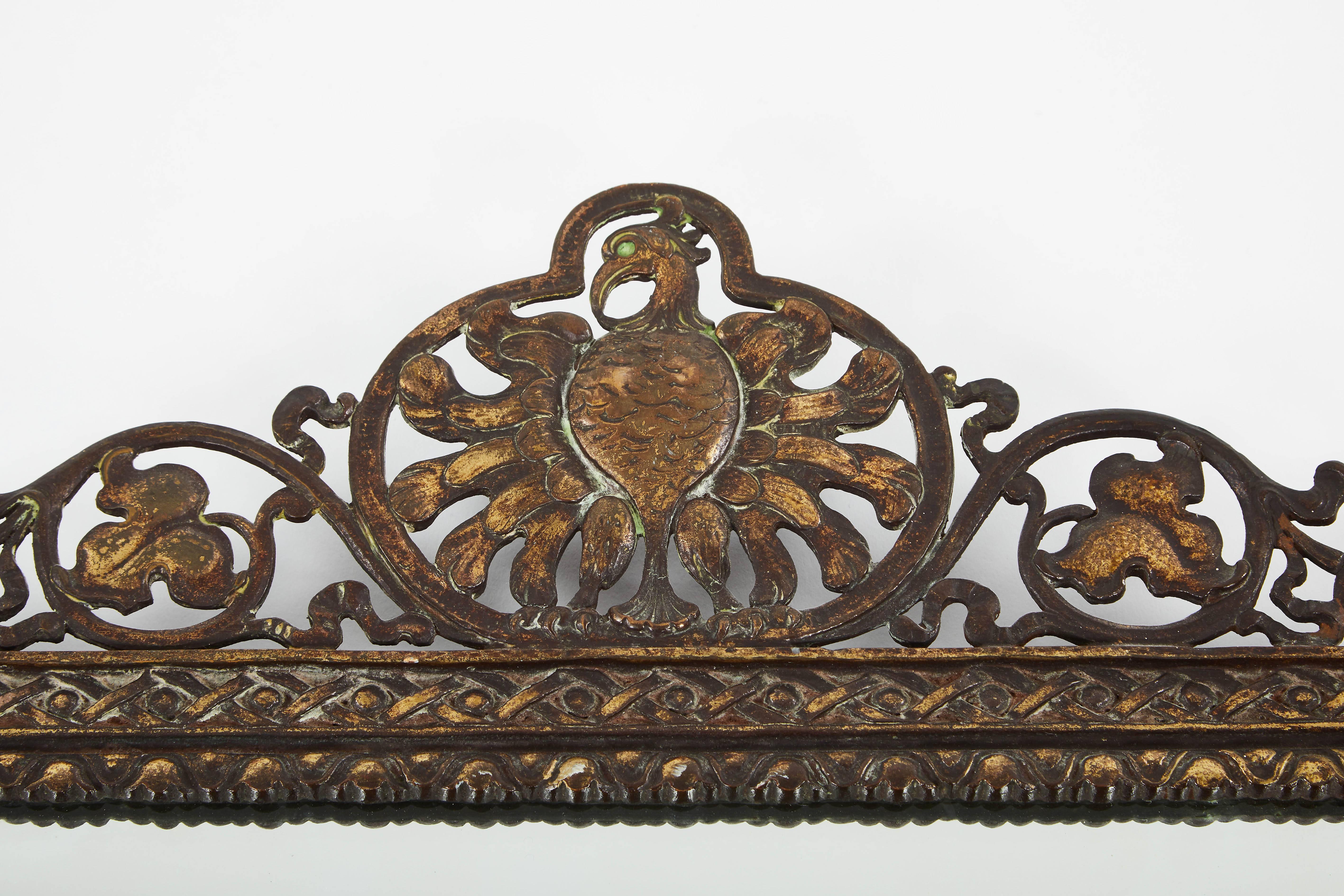 Gilt Spanish Gilded Iron Wall Mirror with Figural Bird and Scroll Details, circa 1930