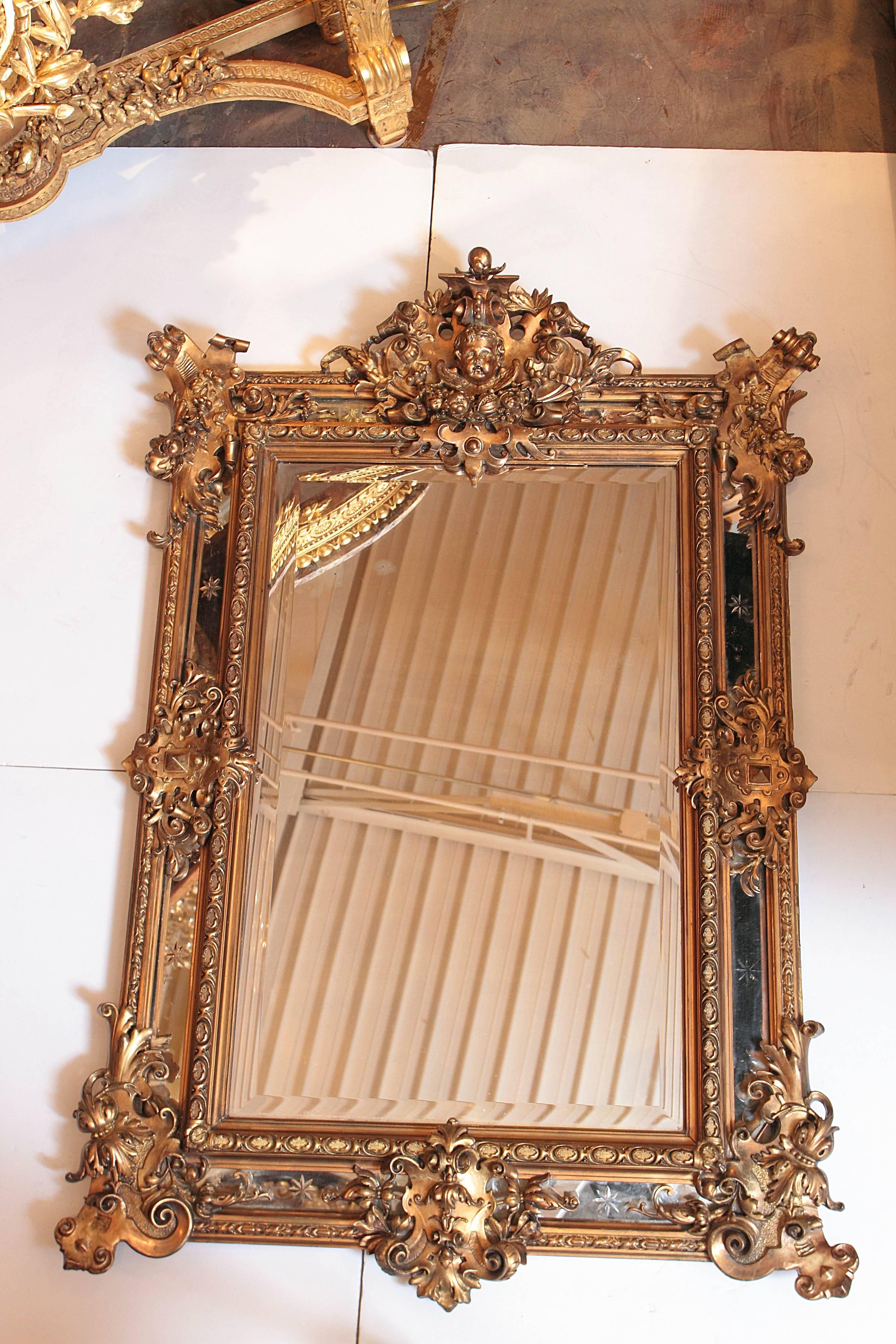 19th century French Louis Philippe gilt carved cherub mirror.