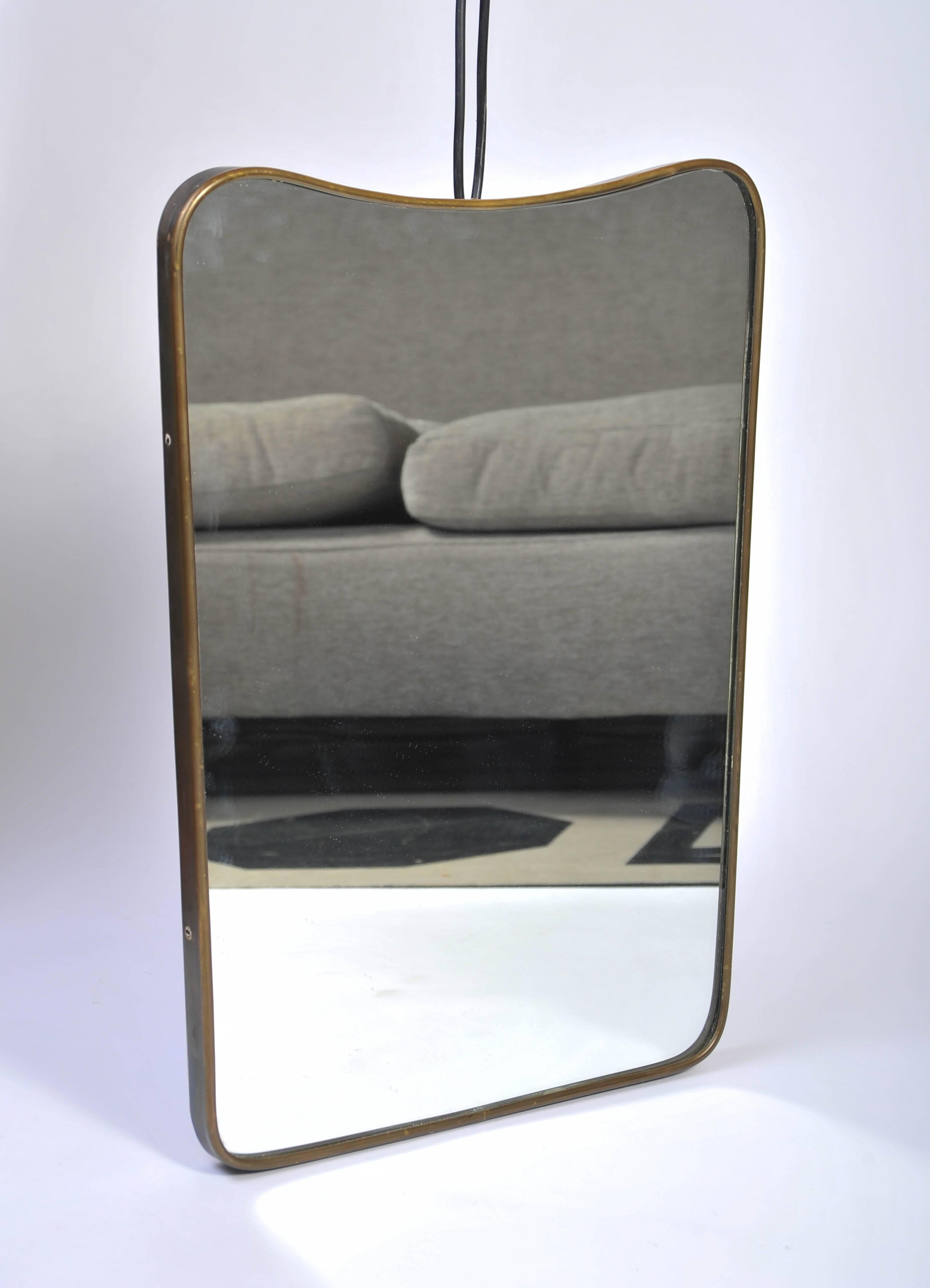 1960s Italian brass frame mirror by Gio Ponti dated on the back.