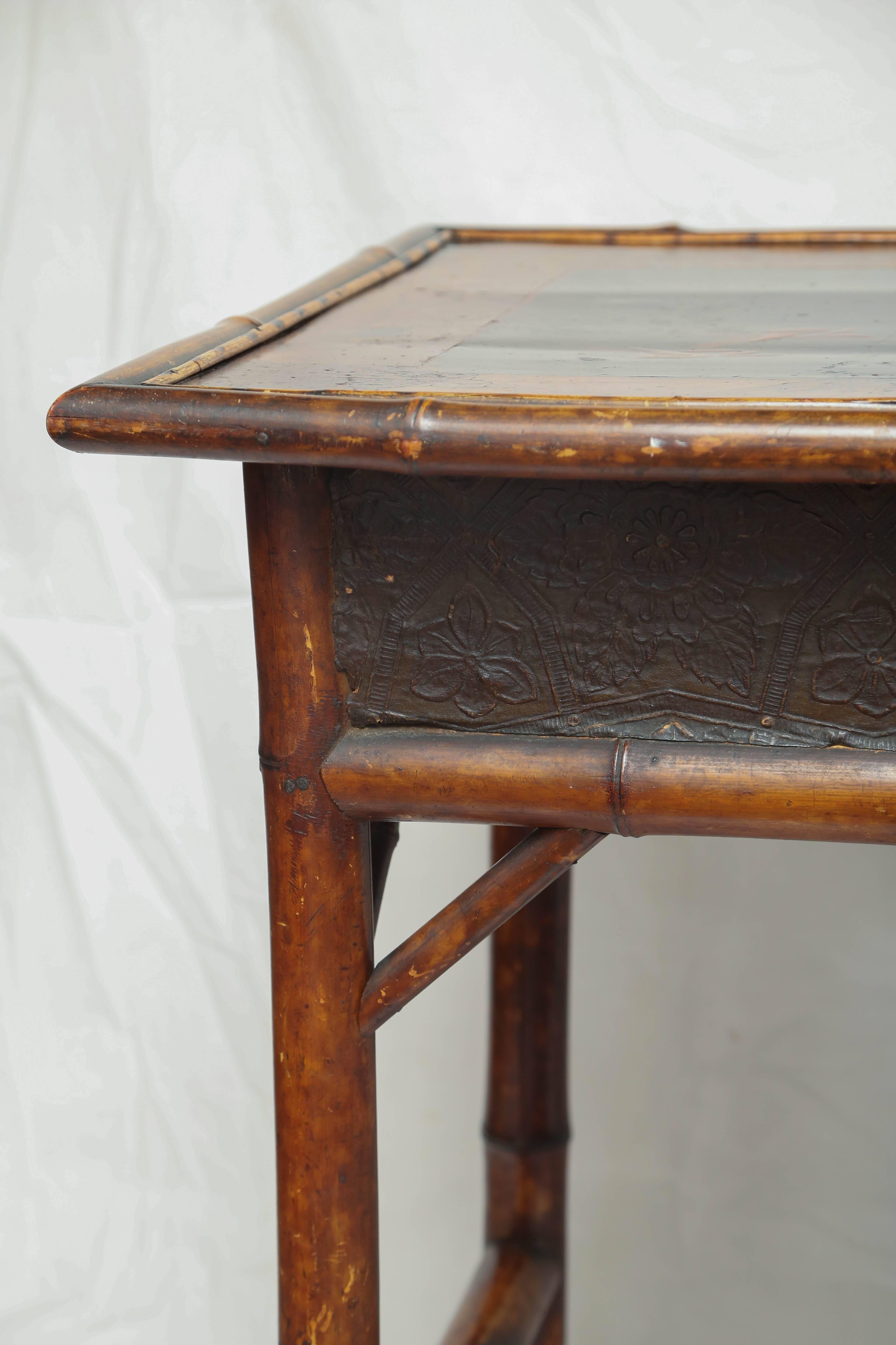 Very nice English bamboo lacquer side table with Japanning and a drawer.
