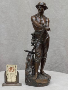 Bronze Figure of a Miner