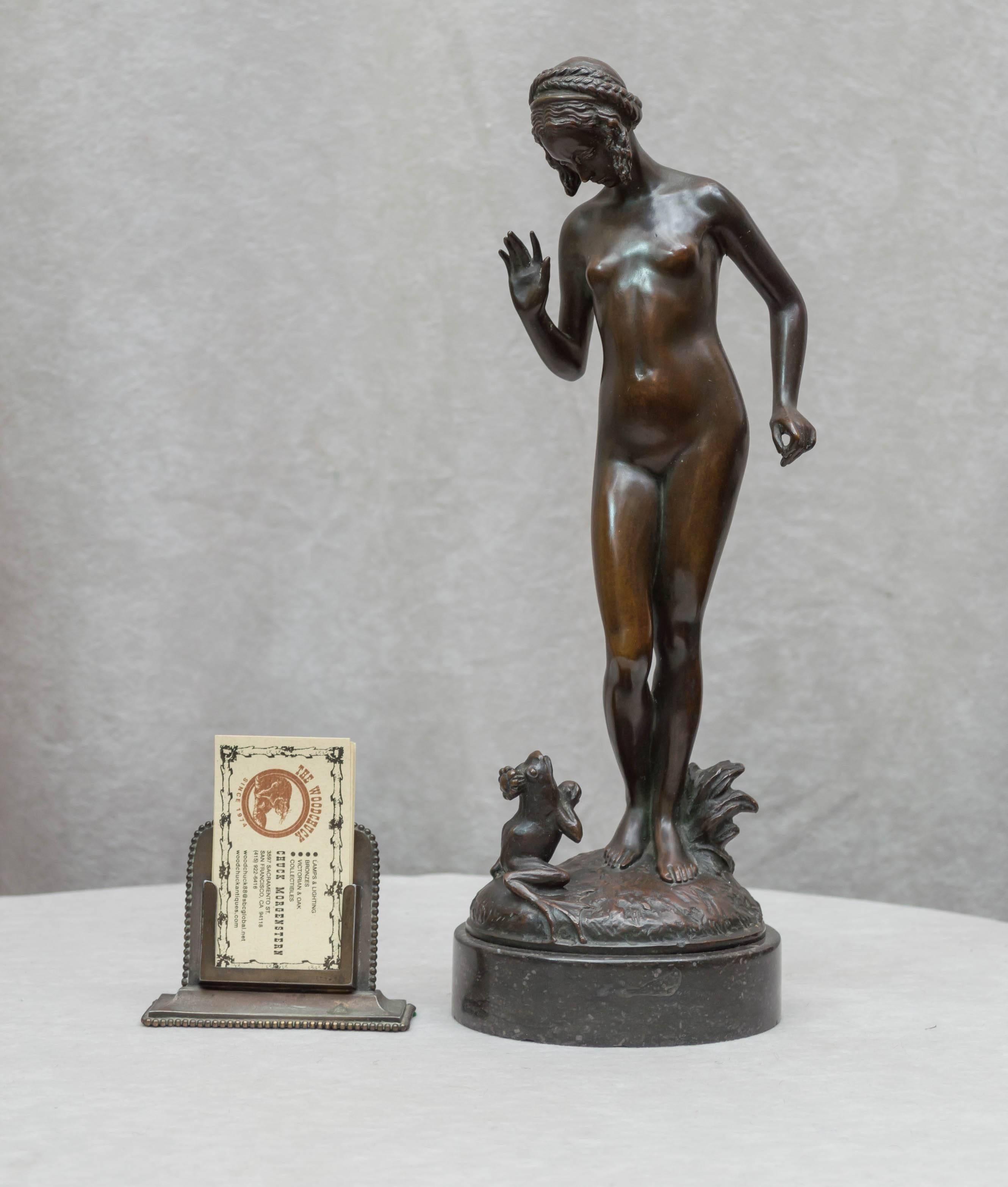 We are always looking for the unusual and the whimsical. Here we have both. The beautiful nude maiden is standing there while the little frog with the crown waits below, I suppose hoping for a kiss to turn into a prince. Fine detail and patina make