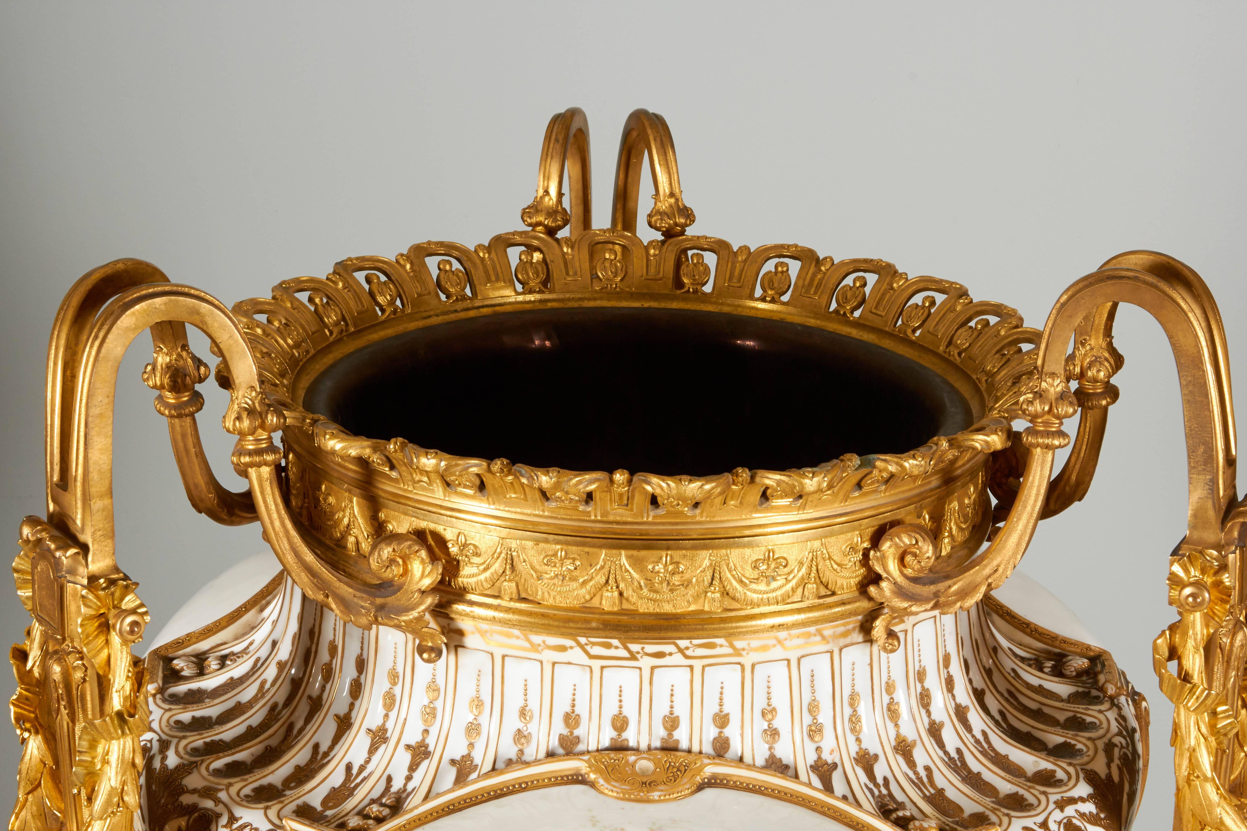A highly important and palatial /monumental pair of Sèvres-style porcelain jardinieres / vases / planters mounted in the finest ormolu. Most definitely commissioned for a royal family in Paris.

19th century, circa 1880.

Porcelain Signed Eug.