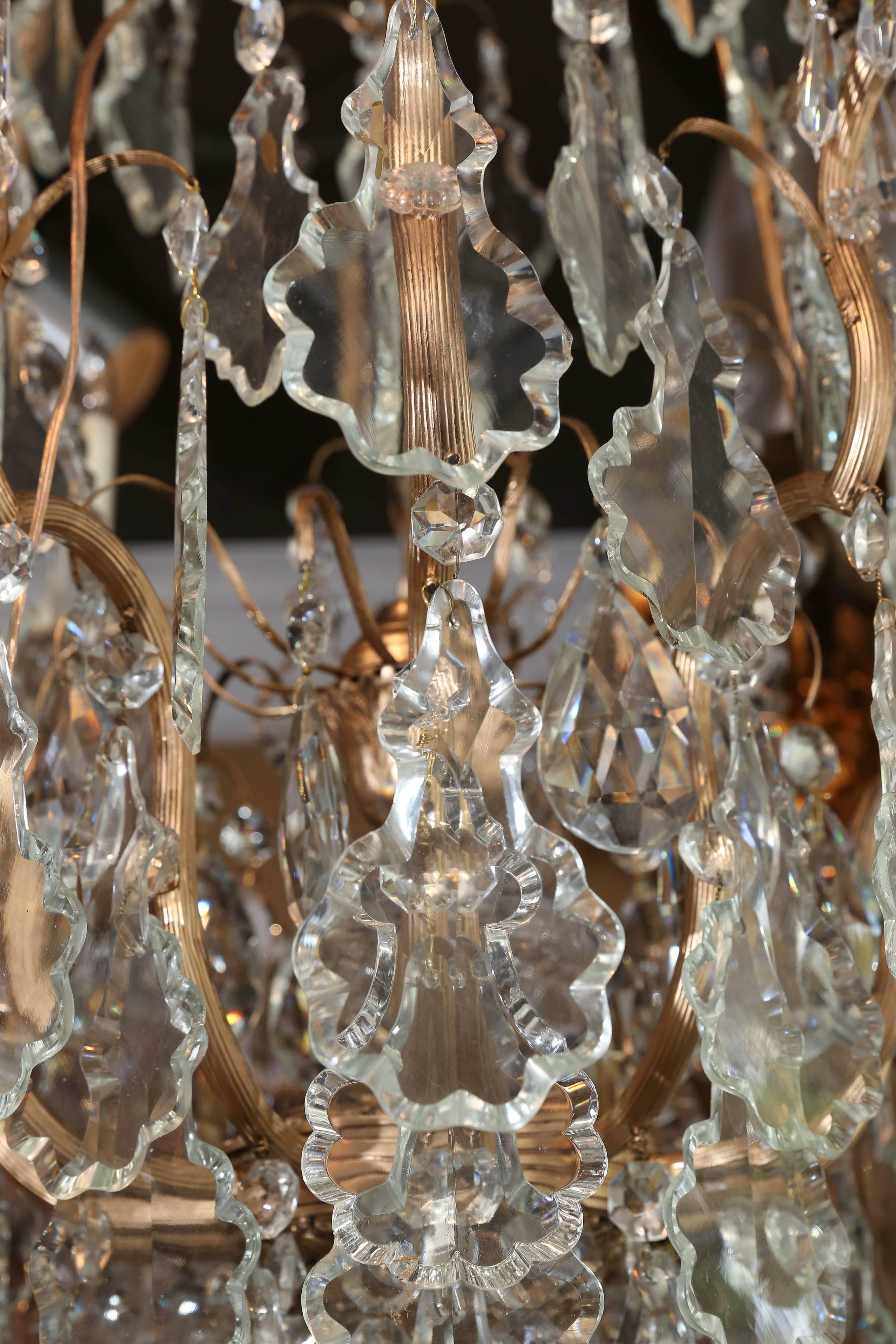 20th Century Large French Gilt Metal and Crystal Twelve-Light Chandelier