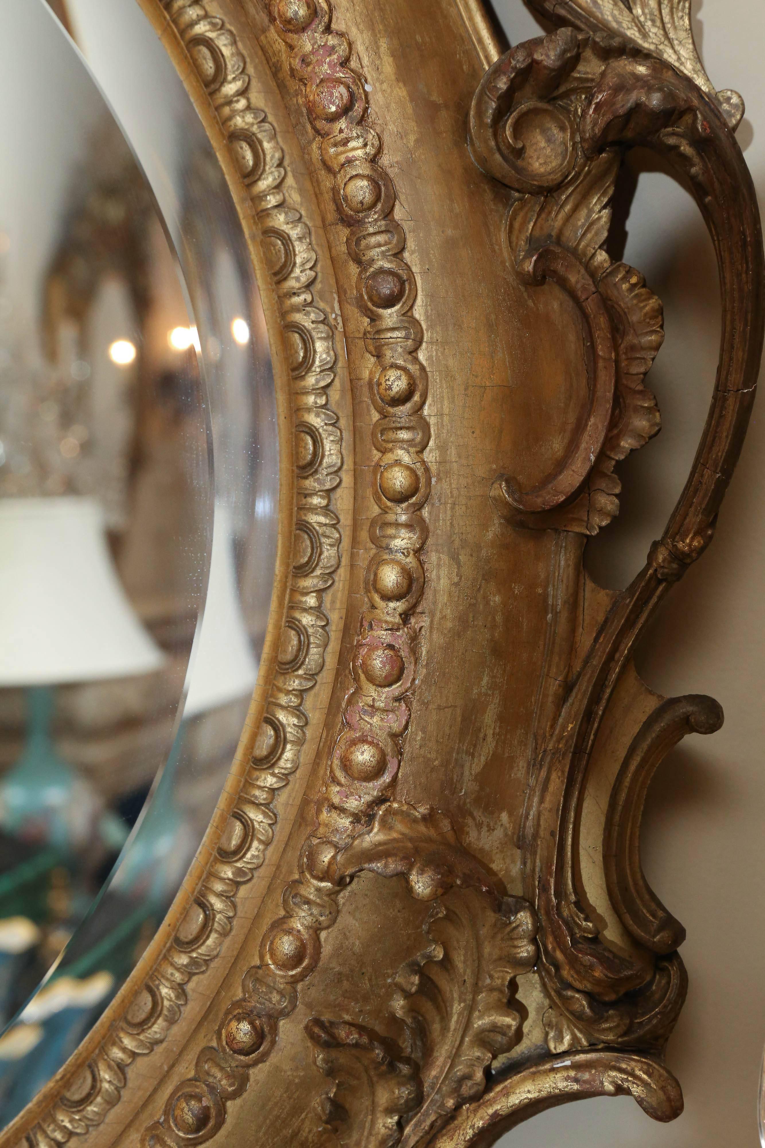 Luigi XV Coppia di specchi ovali in legno dorato Louis Philippe, XIX secolo, gusto rococò in vendita