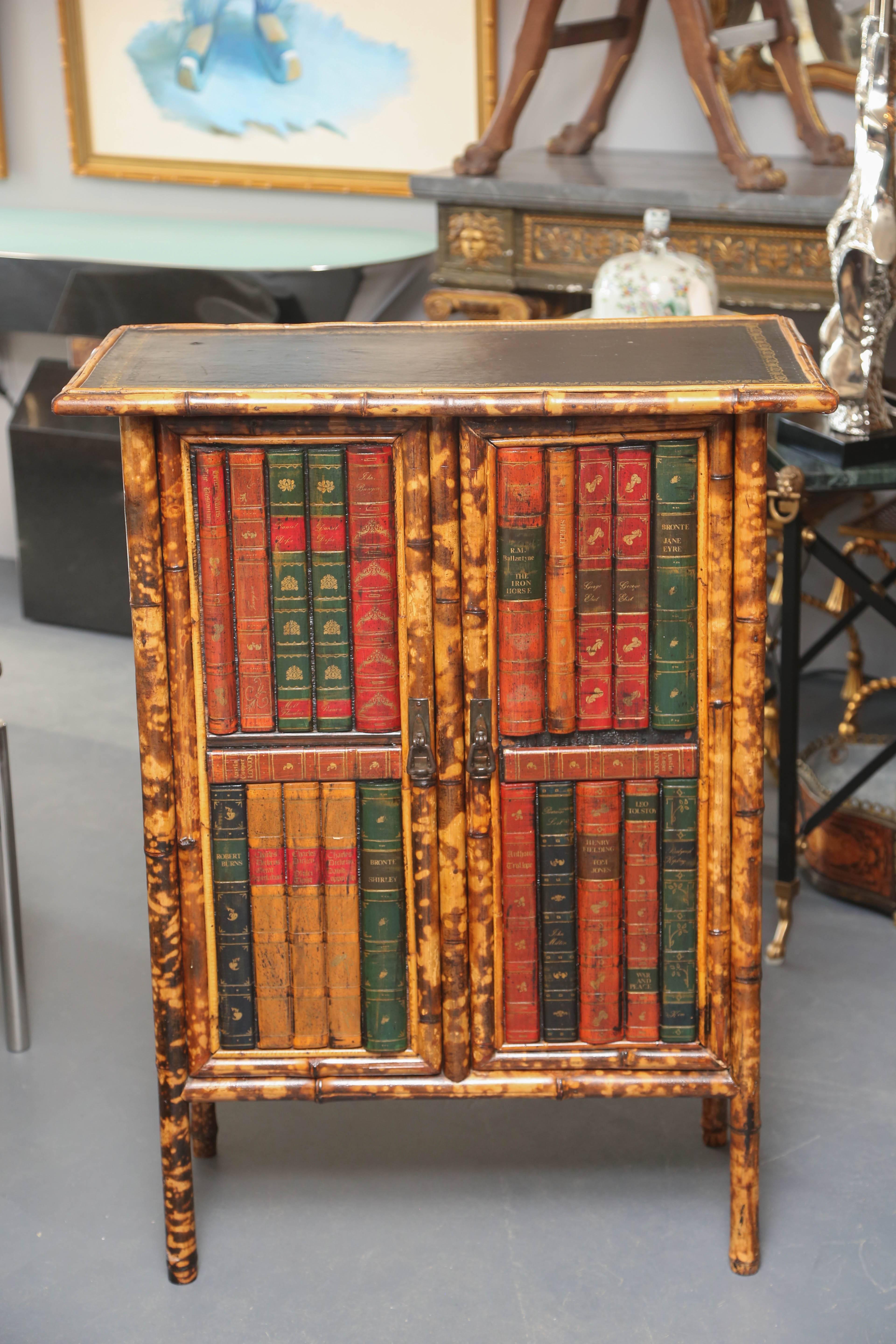 Beautifully detailed with a leather top and leather "book binding" front, nicely finished interior.