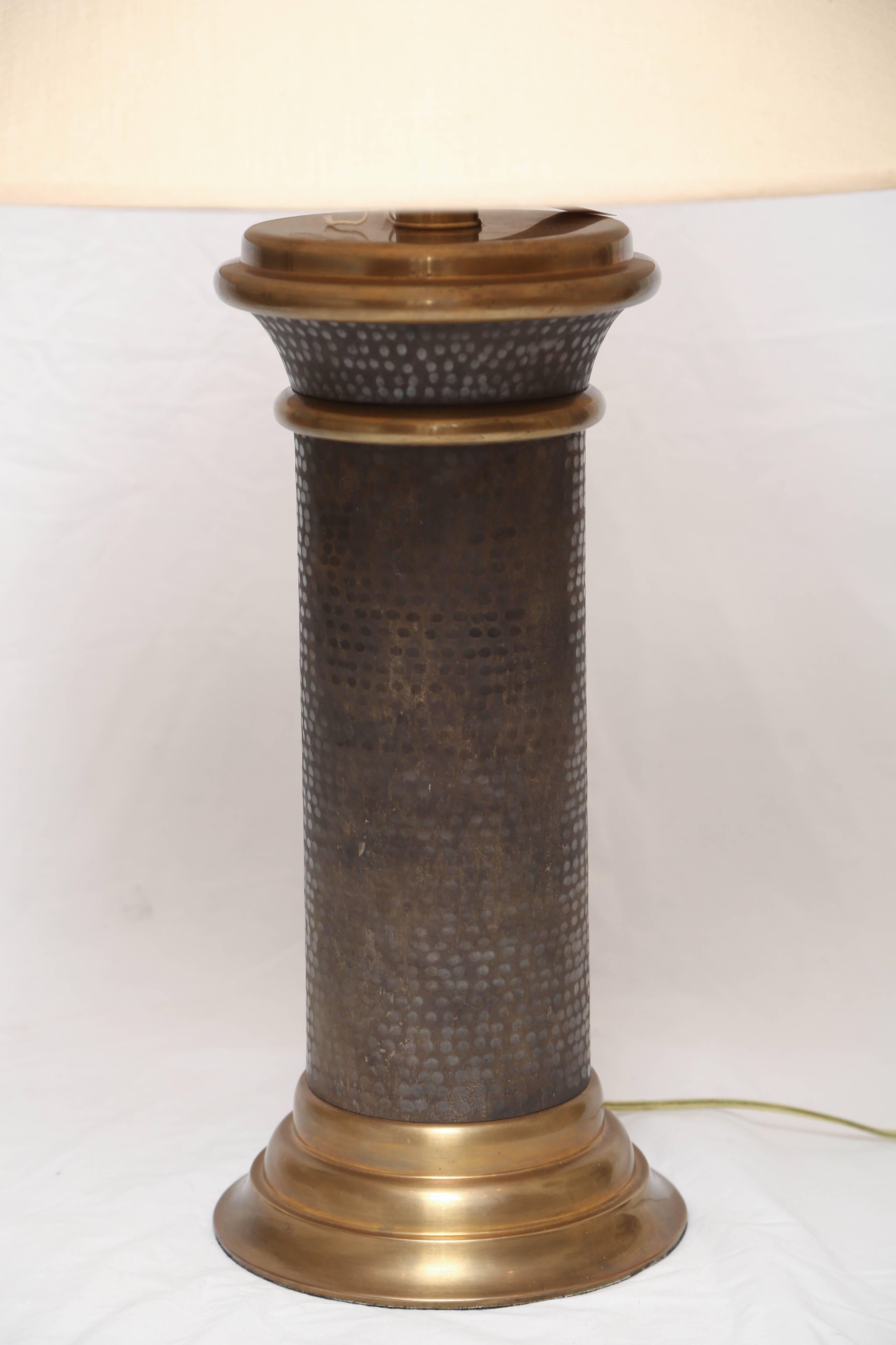 Handsome pair of cylinder shaped mottled brass table lamps by Chapman.