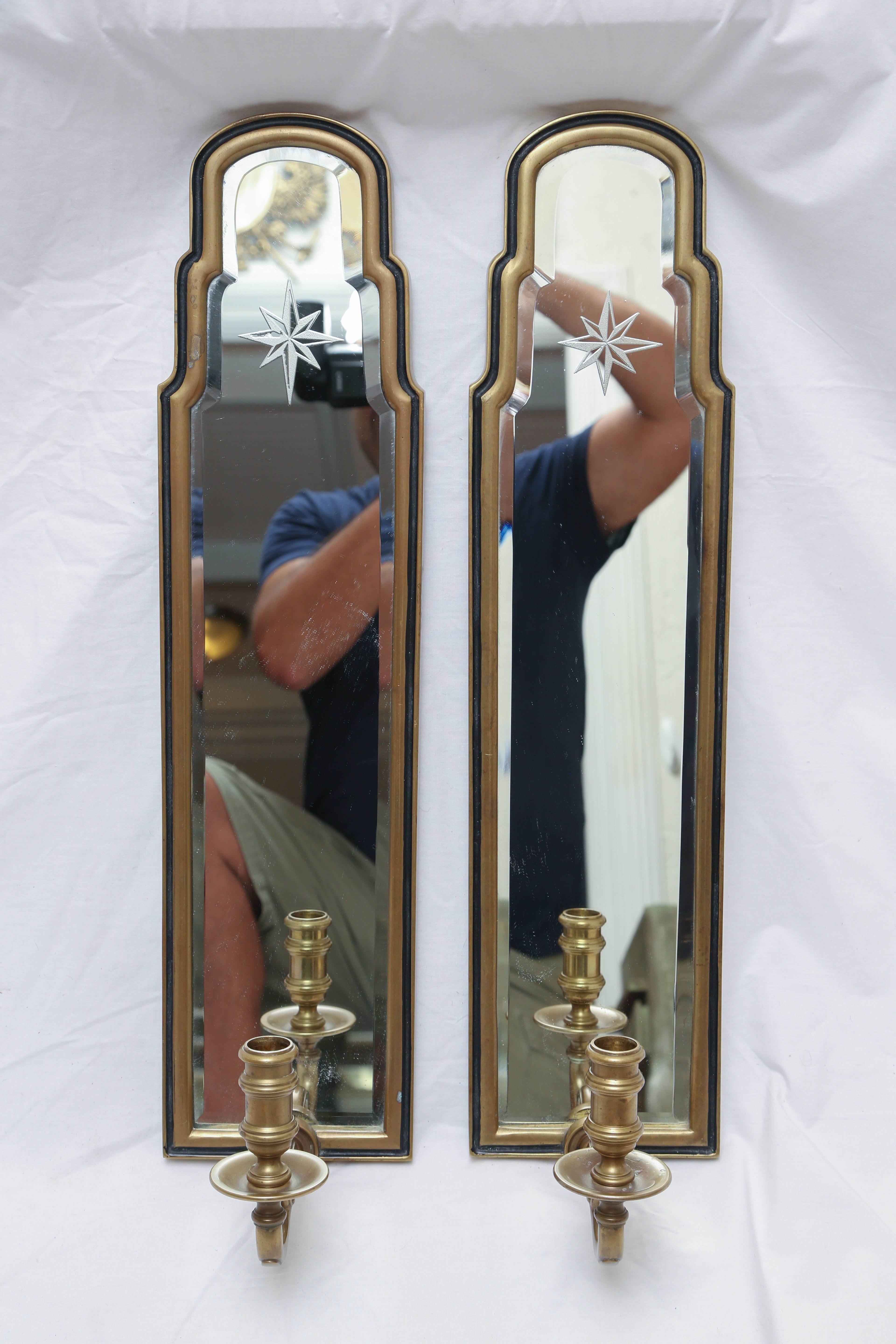 Vintage pair of Chapman mirrored sconces (non electrified) with etched starburst design near top. Solid brass frames.