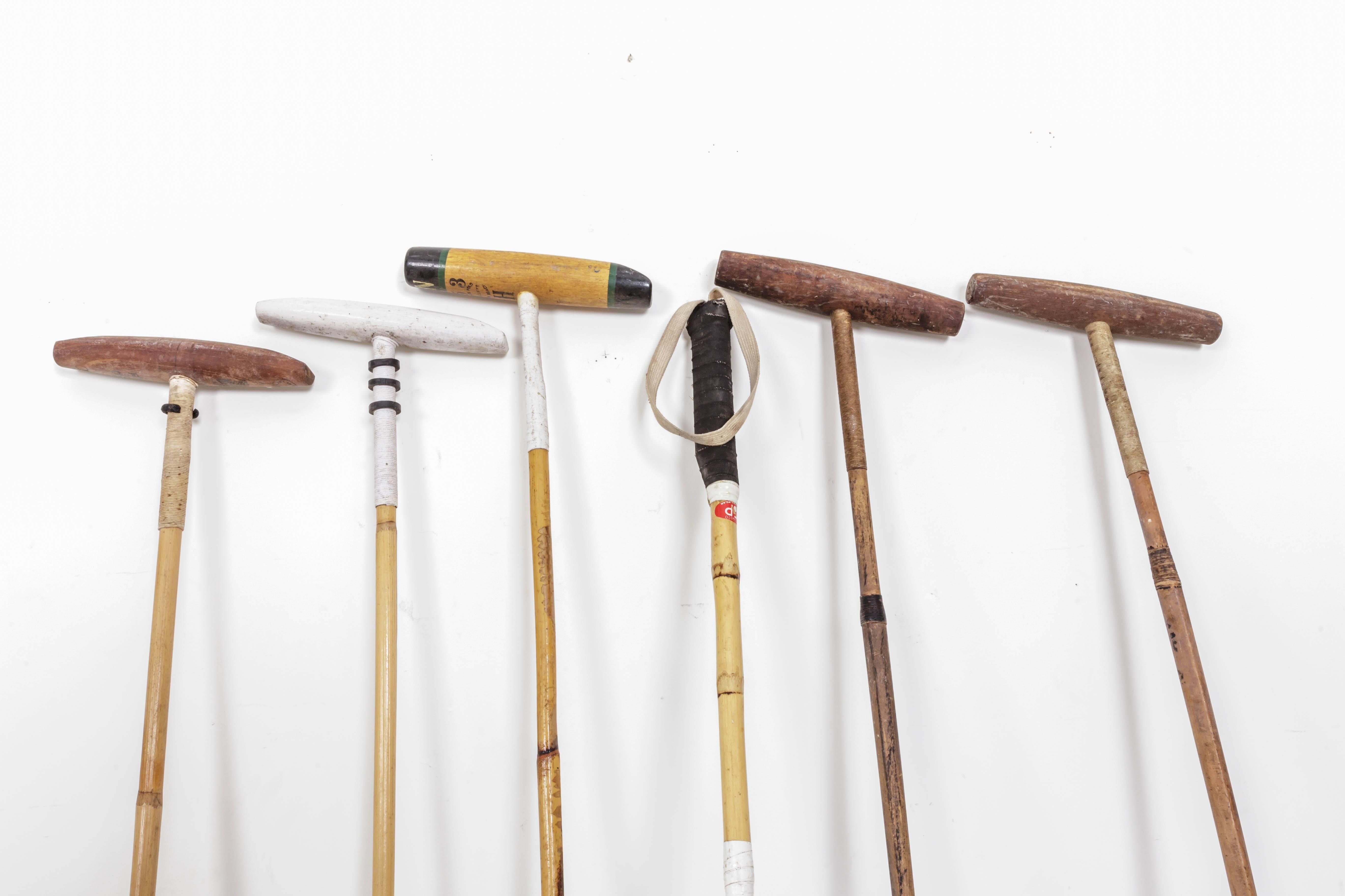 Six vintage polo mallets Classic style from the 20th century.