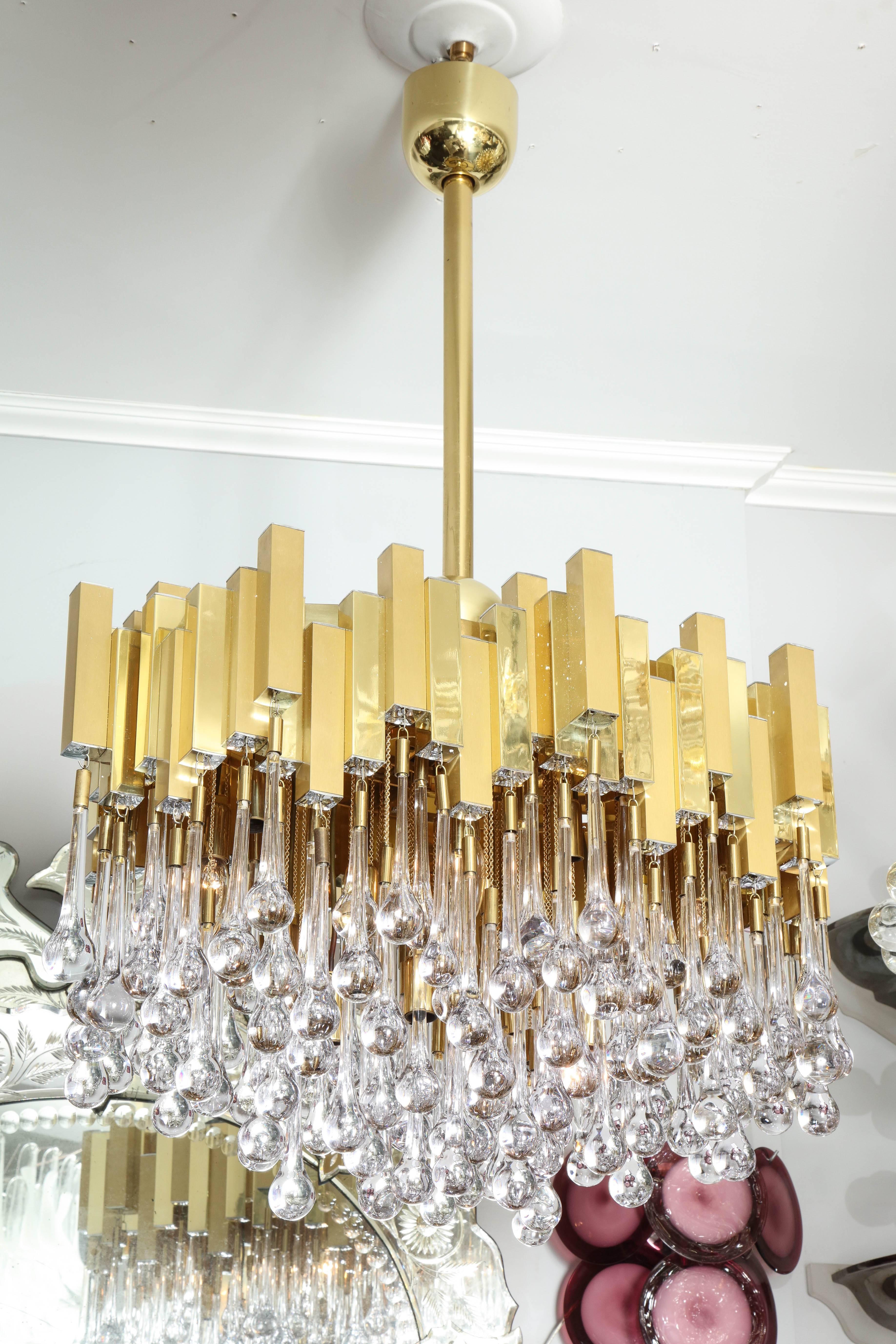 Gaetano Sciolari brass chandelier with teardrop glass.
