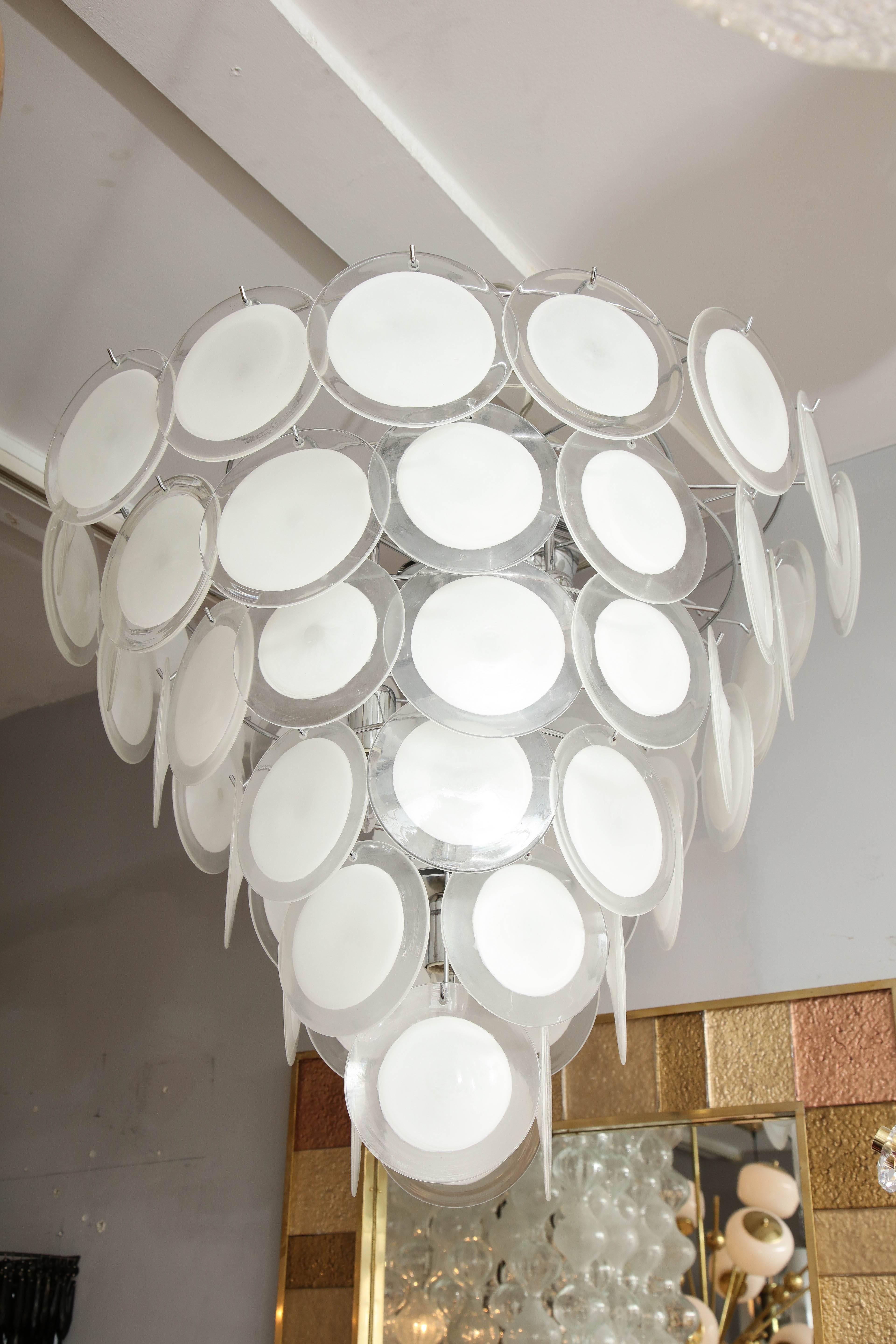 Custom white Murano glass disc tiered chandelier. Custom orders are available for different sizes, finishes, shapes and glass colors.