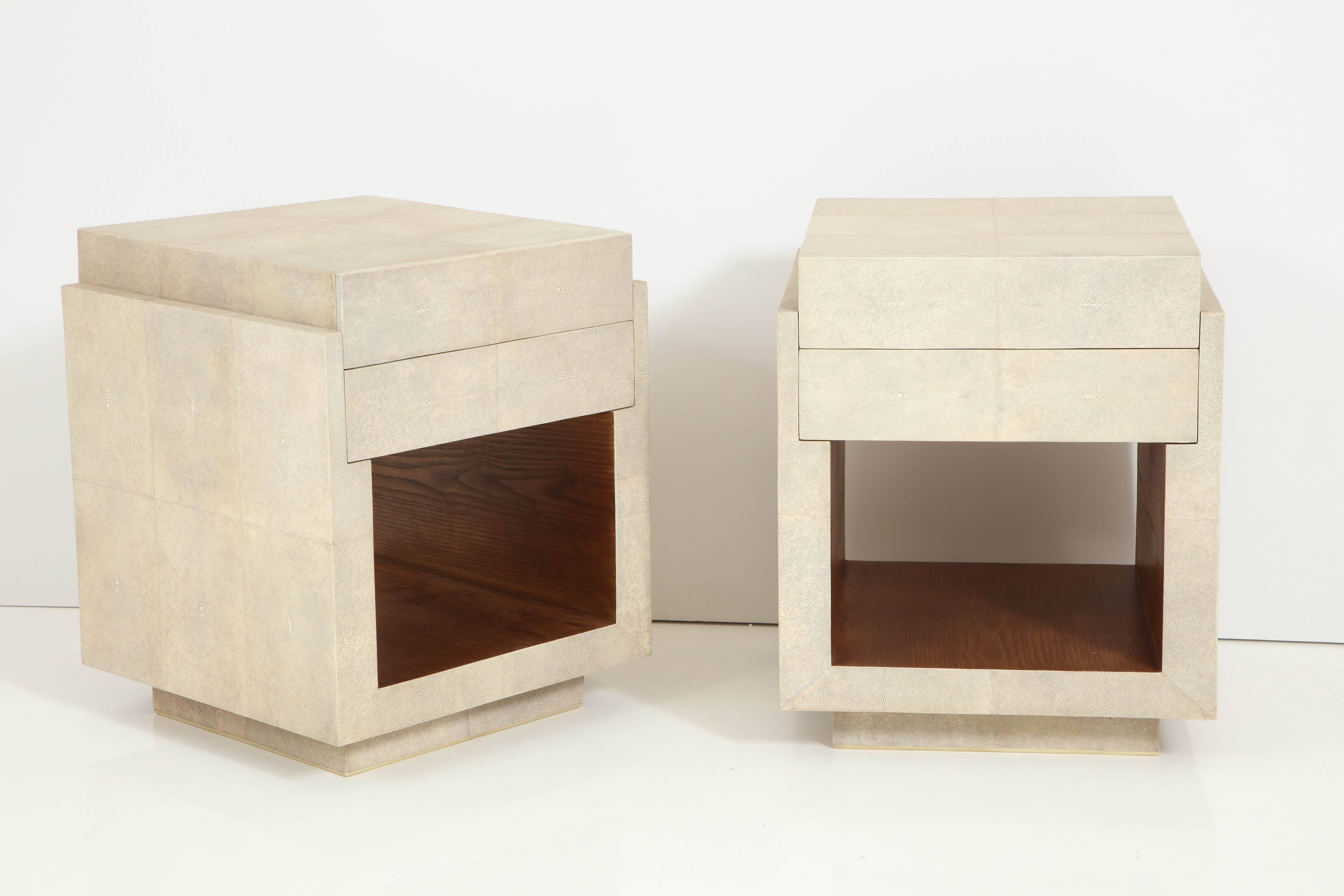 Decorative shagreen bedside tables or side tables with two drawers. The side tables have palm wood inside the opening. 
Shagreen is made of stingray, a very beautiful material. They can also be ordered in different colors shagreen, antique black,