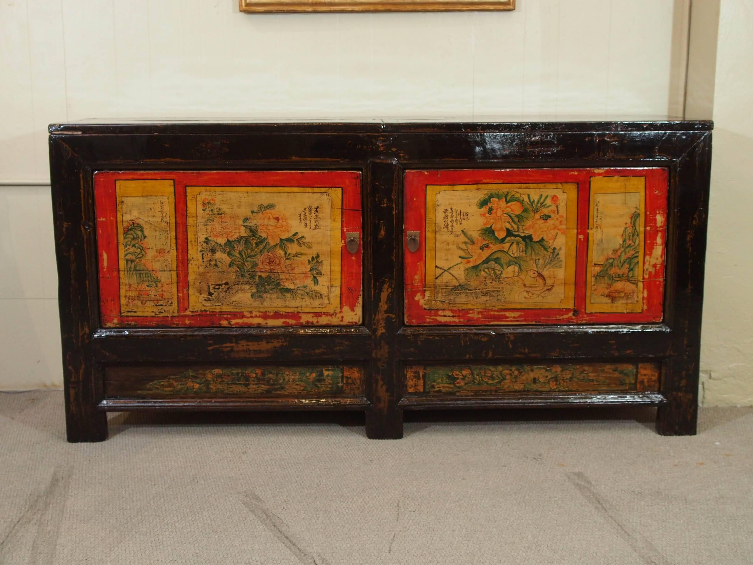 Antique Chinese black lacquer rice cabinet, circa 1915.