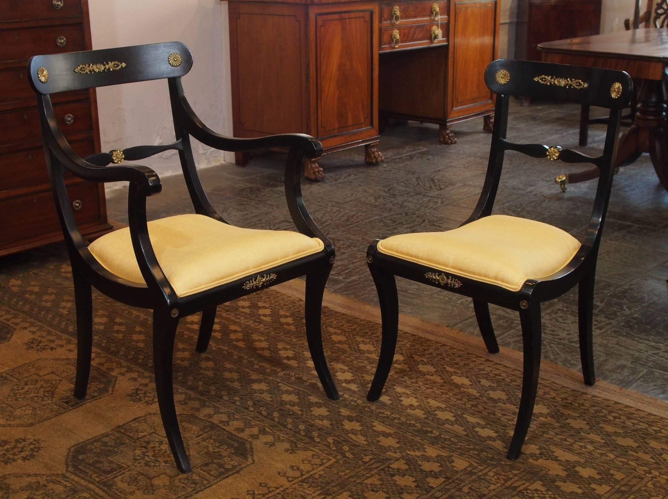 Set of eight ebonized dining chairs, Regency style, circa 1920.