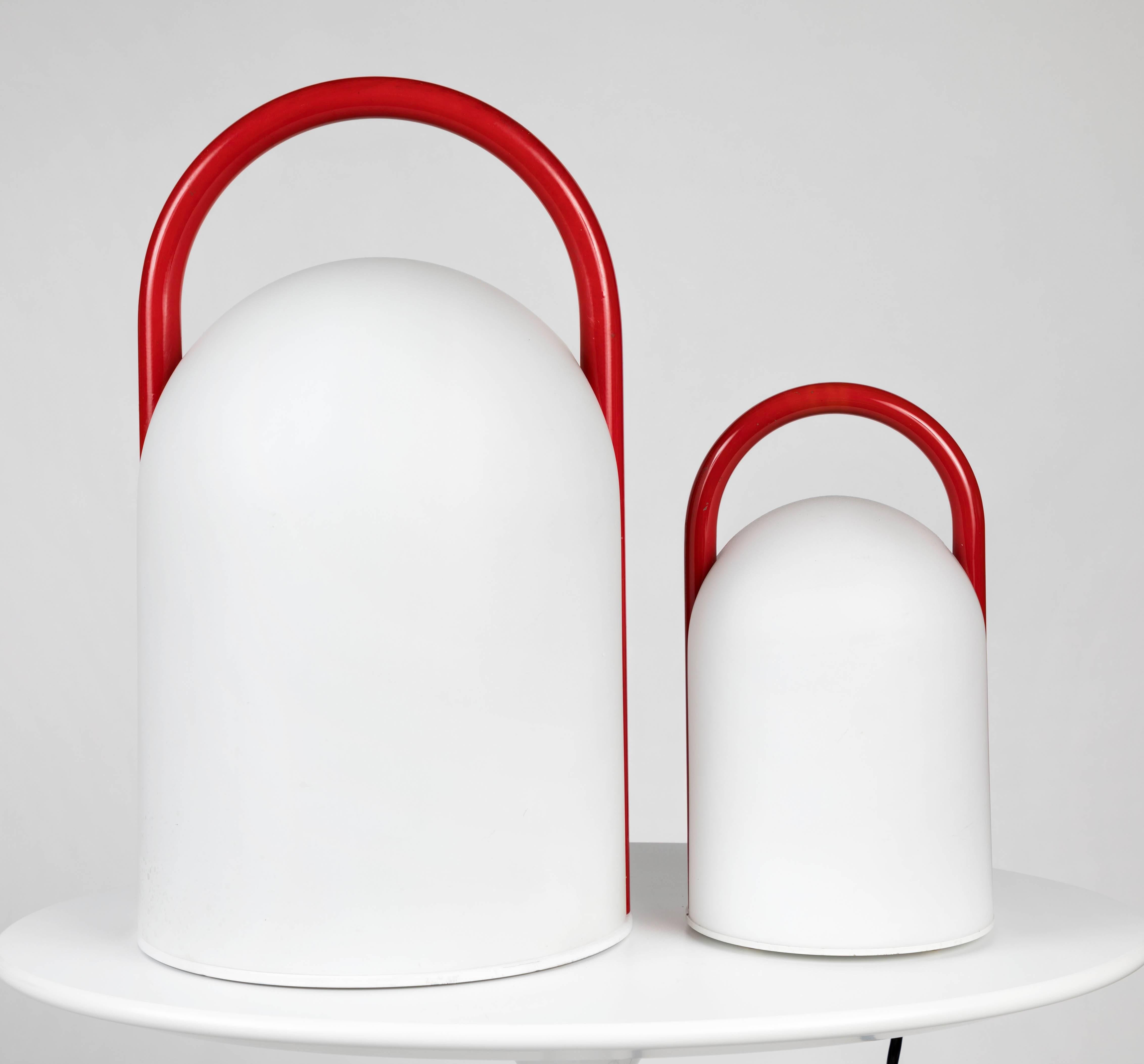 Large Romolo Lanciani 'Tender' table lamp for Tronconi. A rare large-scale example executed in opaline glass and red enameled metal, circa 1980s, Italy. A surprisingly refined and minimal design, especially for its time and place.

Tronconi was a