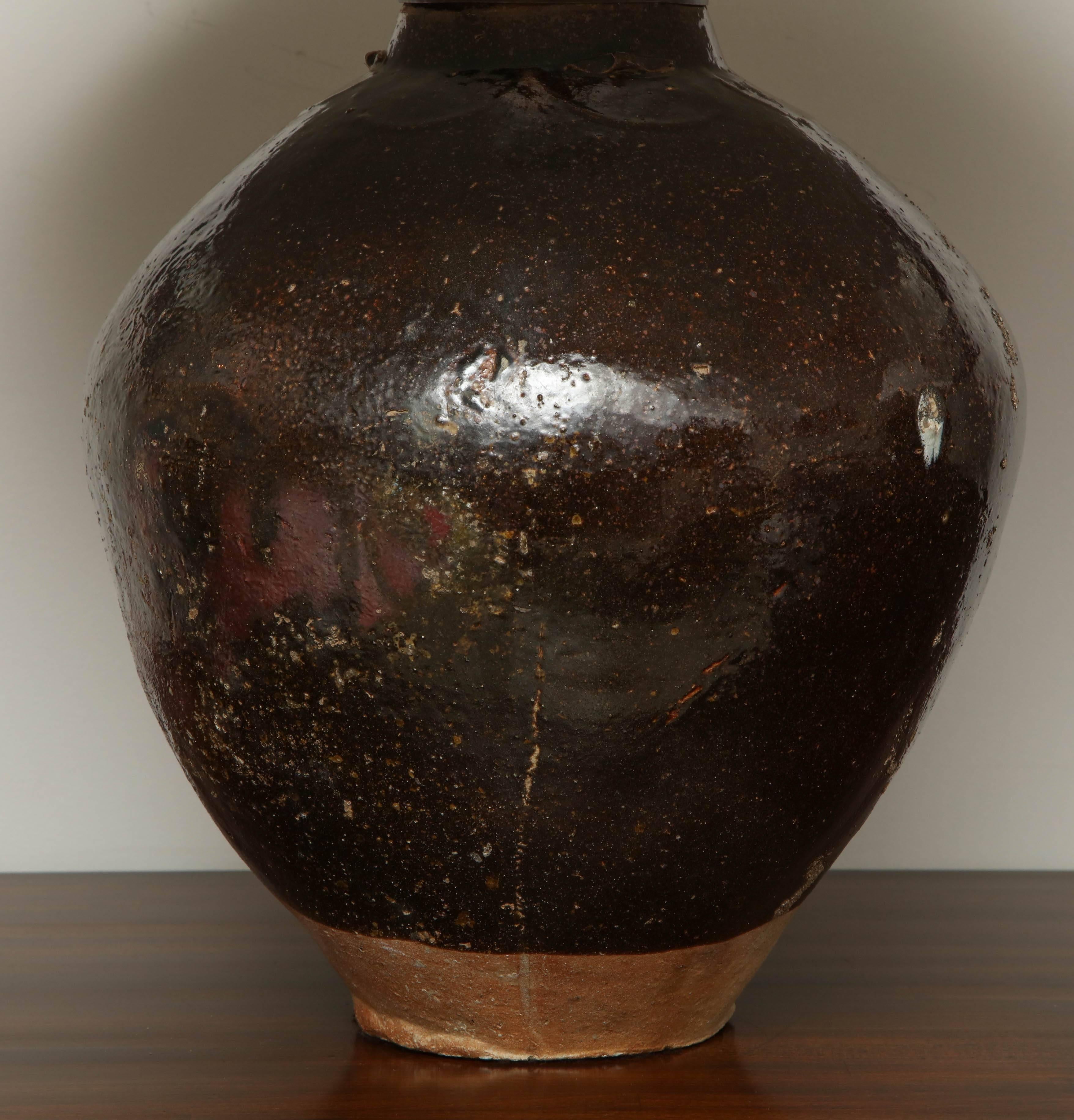 A lovely glazed wine vessel lamp of Chinese origin, made in the late 19th century.