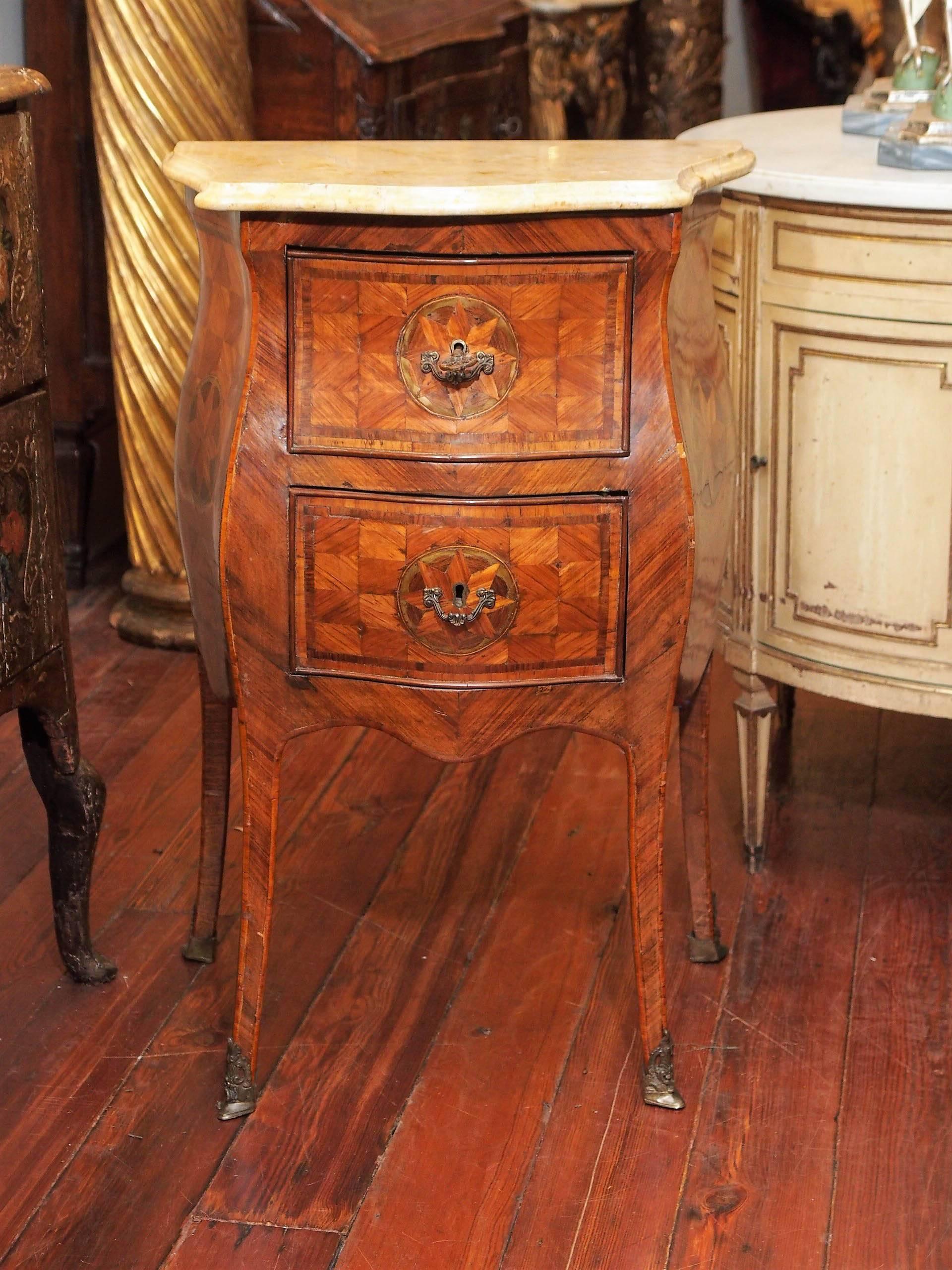 Pair of 18th century bombe form one drawer one door Commodini with Sienna marble tops.