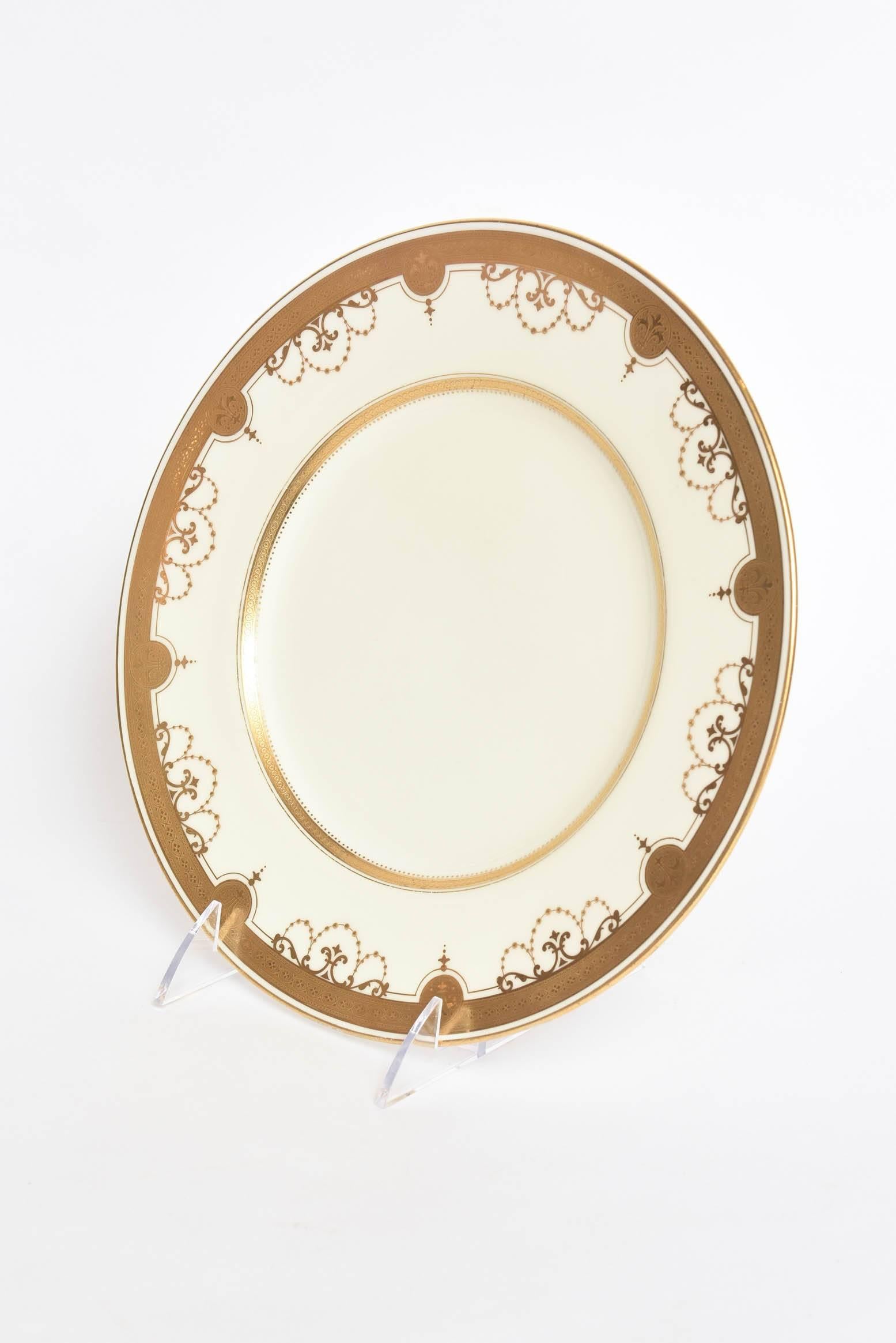 A Classic and wonderful antique pattern by Minton, England. We love the crisp detailing of the collar decoration in their signature raised tooled bead and gold medallion design. Nice clean centers and would mix and match with all your fine porcelain