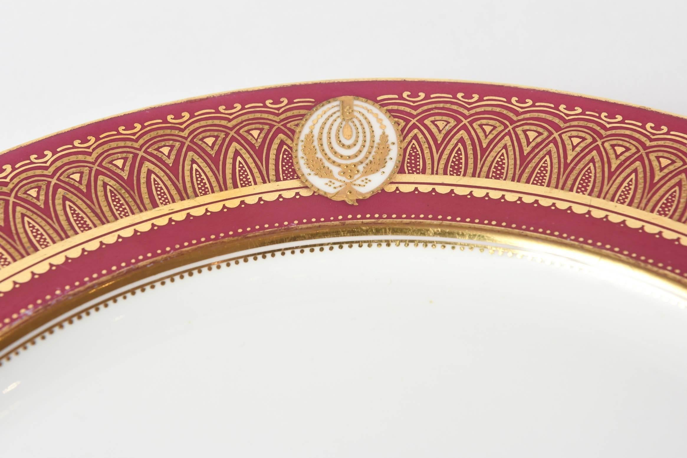 Stunning Ruby Red & Gilt Dinner Plates, Gold Medallion Centers, Raised Detail.11 In Good Condition In West Palm Beach, FL