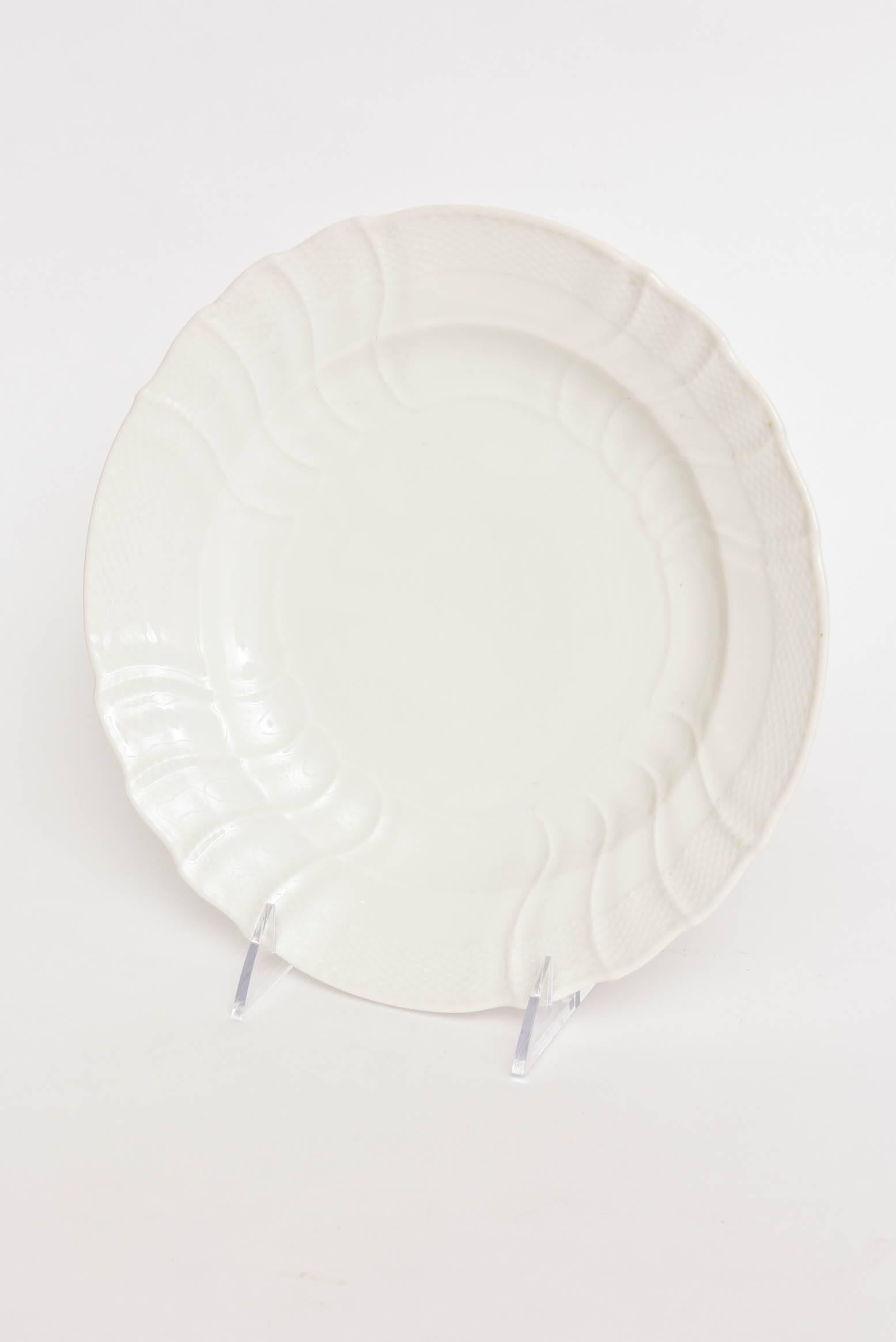 An elegant set of last quarter of the 19th century crisp all white dinner plates. Their Classic design which they still produce today, and is the base for all their wonderful hand-painted designs. These are in super nice antique condition and will