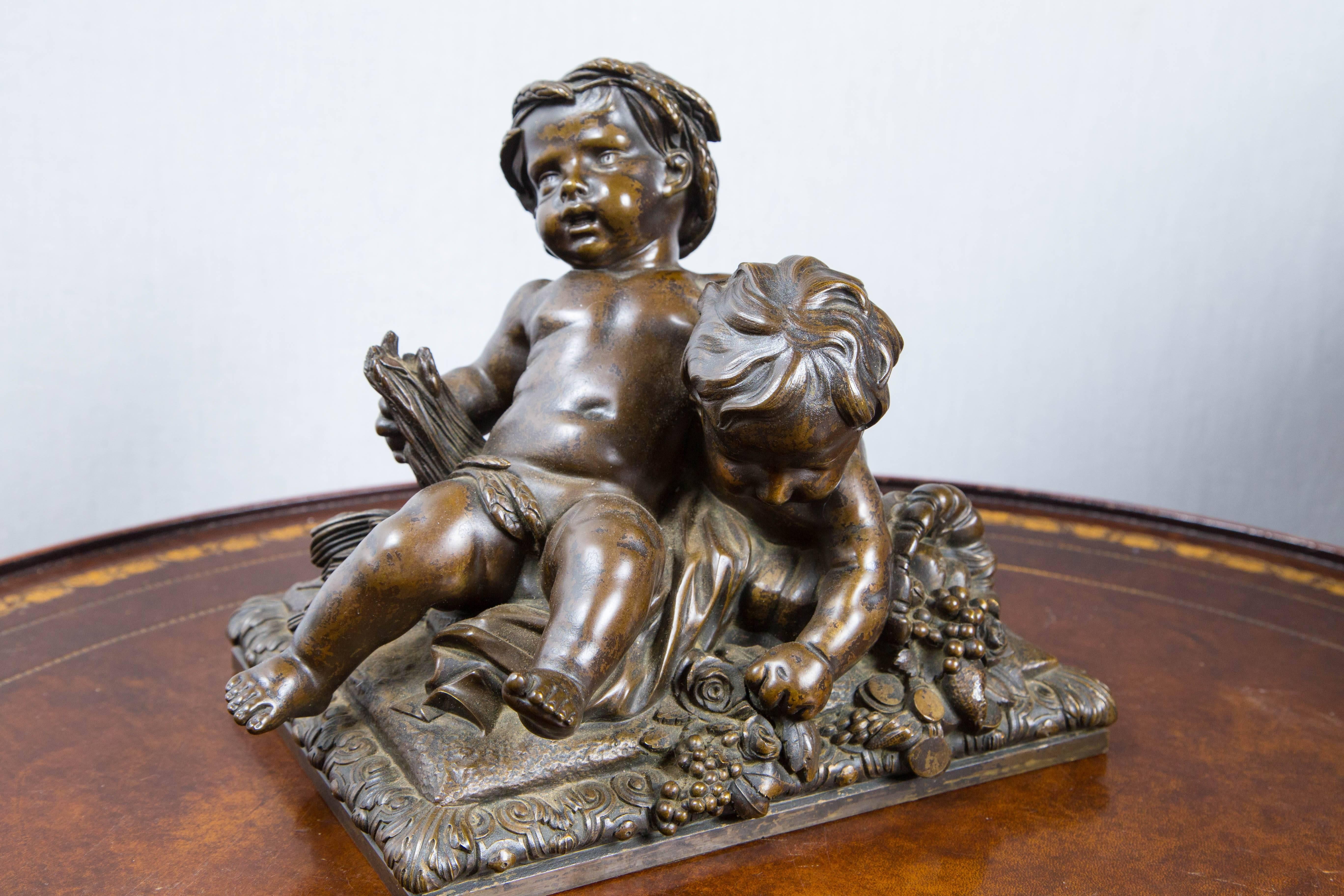 Beautiful bronze allegorical group of two putti, with a deep brown patina. They were originally produced in bisque porcelain. The models have been traced in the Sevres factory documents by Sèvres Archivist Tamara Préaud as the work of sculptor