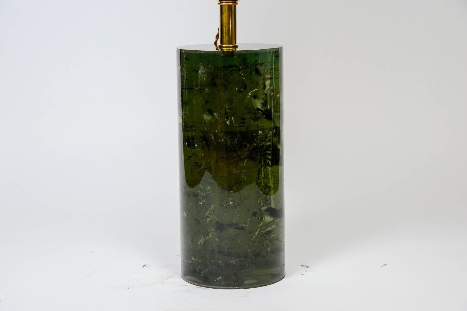 Pair of imposing table lamps made in a deep green fractal resin. Brass neck.