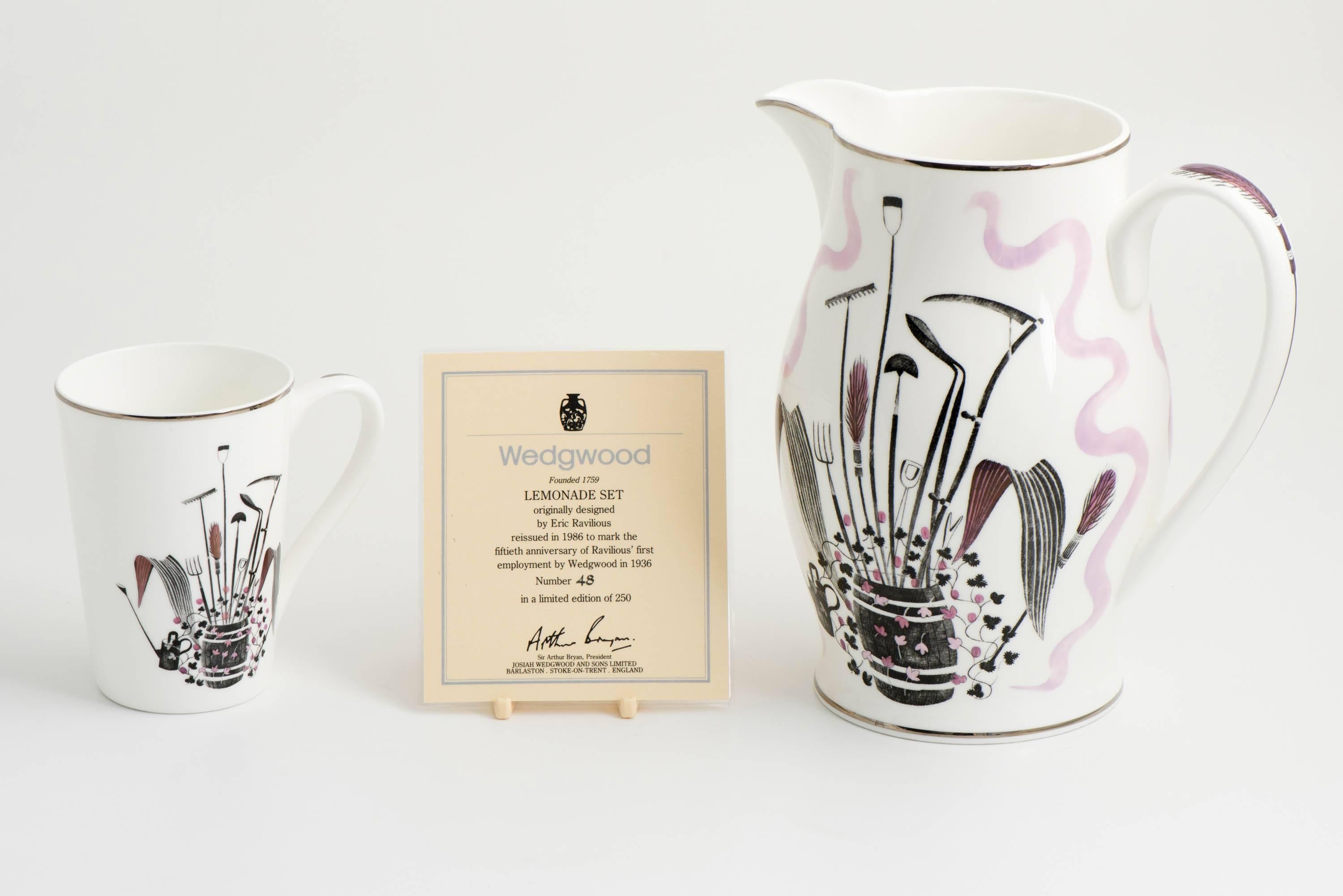 A porcelain lemonade set by Eric Ravilious for Wedgwood.
Comprising a jug and four mugs.
White background printed and coloured with agricultural tools.
No. 48/250. Limited edition dating 1986.
To mark the 50th Anniversry of Ravilious’ first