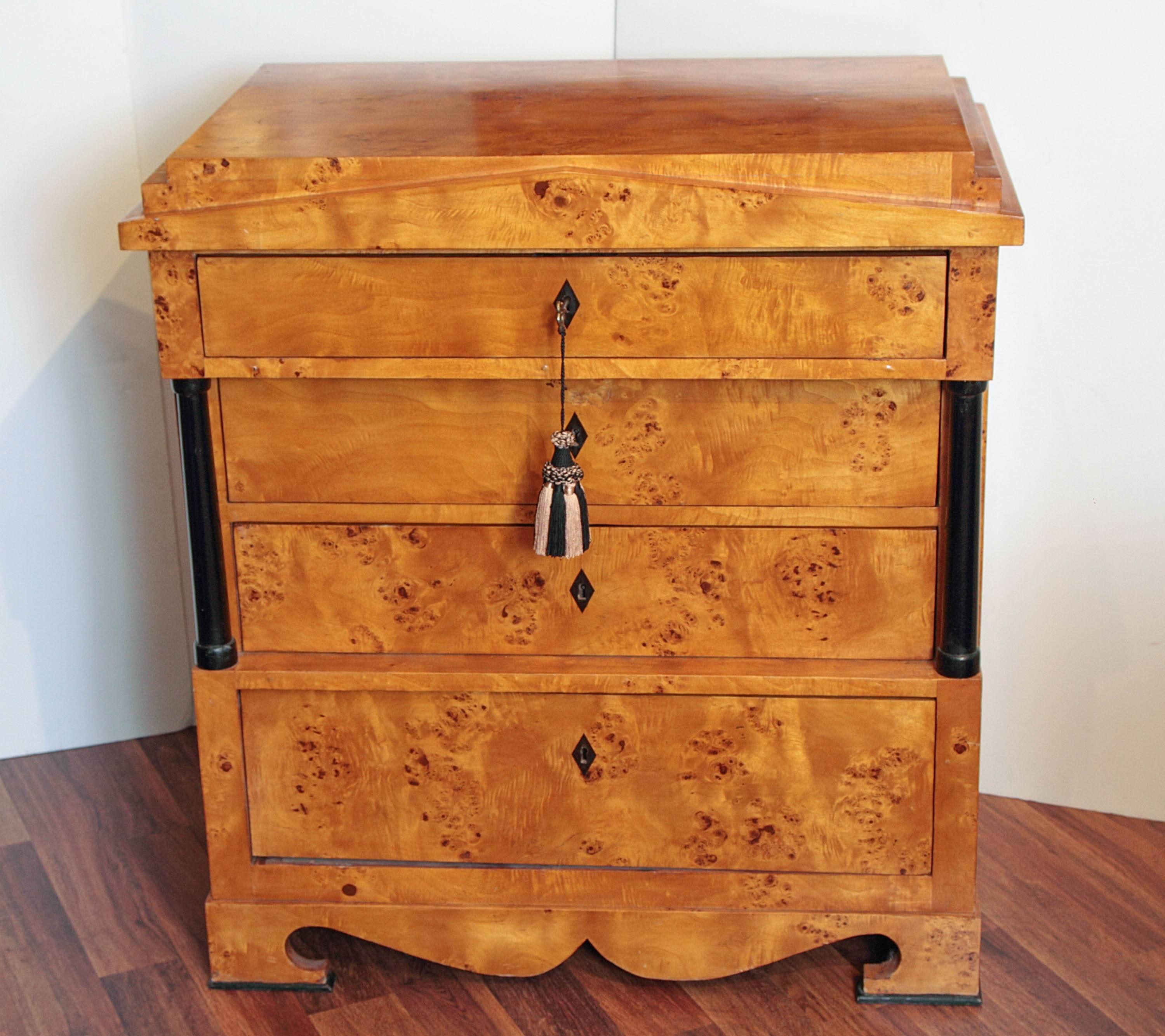 Fine birch Biedermeier commode with ebonized column detail. Beautiful patina.
