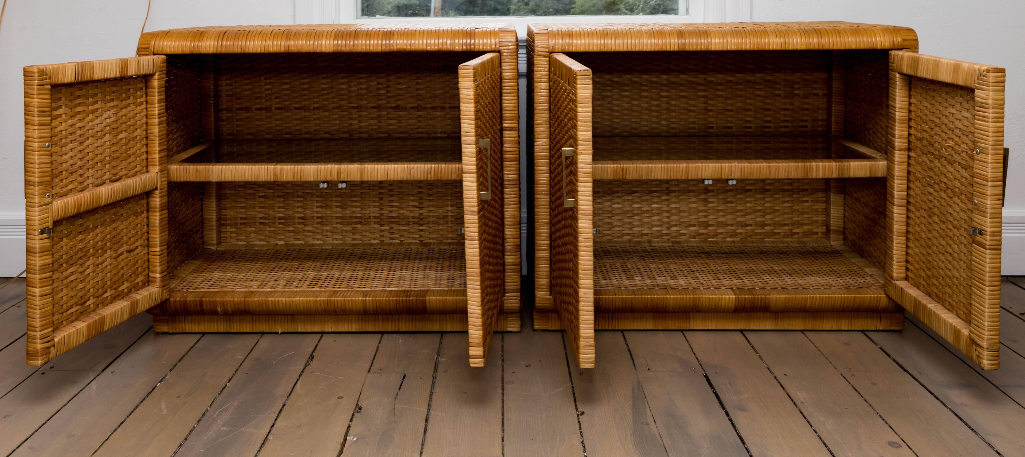 Italian Pair of Rattan Cabinets with Interior Glass Shelf and Brass Detail
