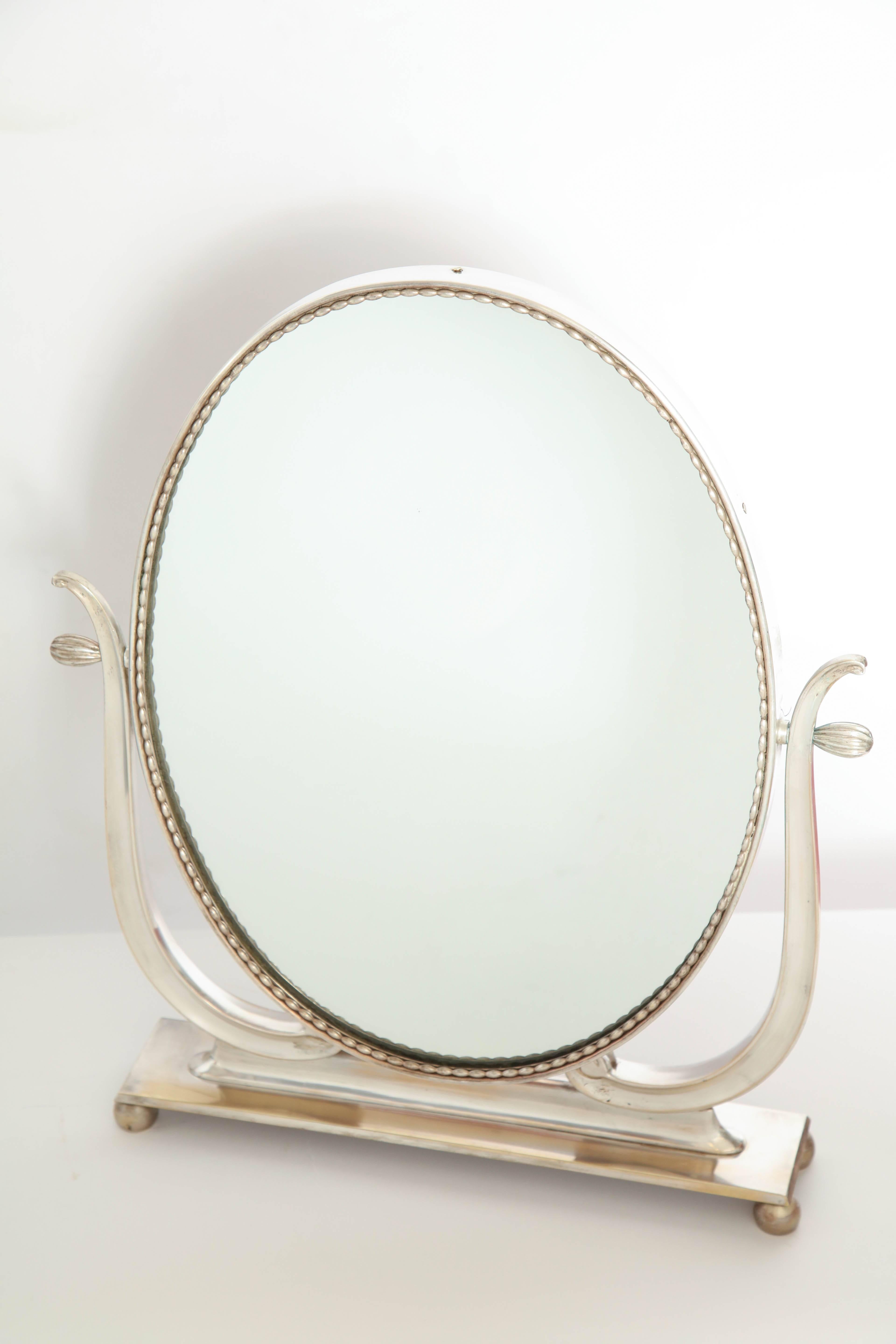 Vanity mirror Art Deco Italy 1930s silver plate adjustable.