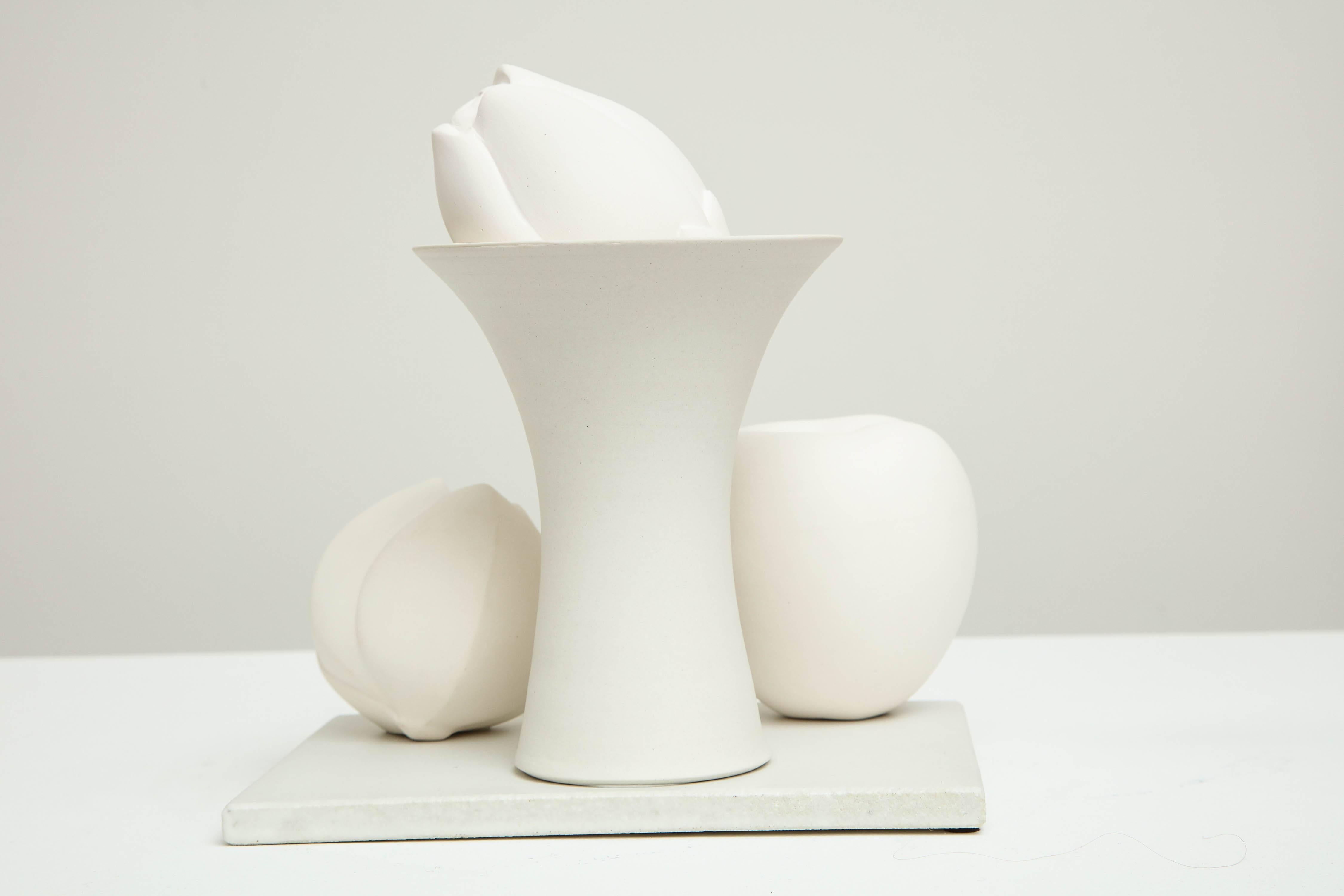Contemporary Still Life in White with Apple, Bud, and Tall Footed Bowl by Anat Shiftan, 2017