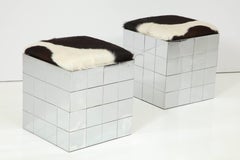 Pair of Cowhide Ottomans in the Style of Paul Evans