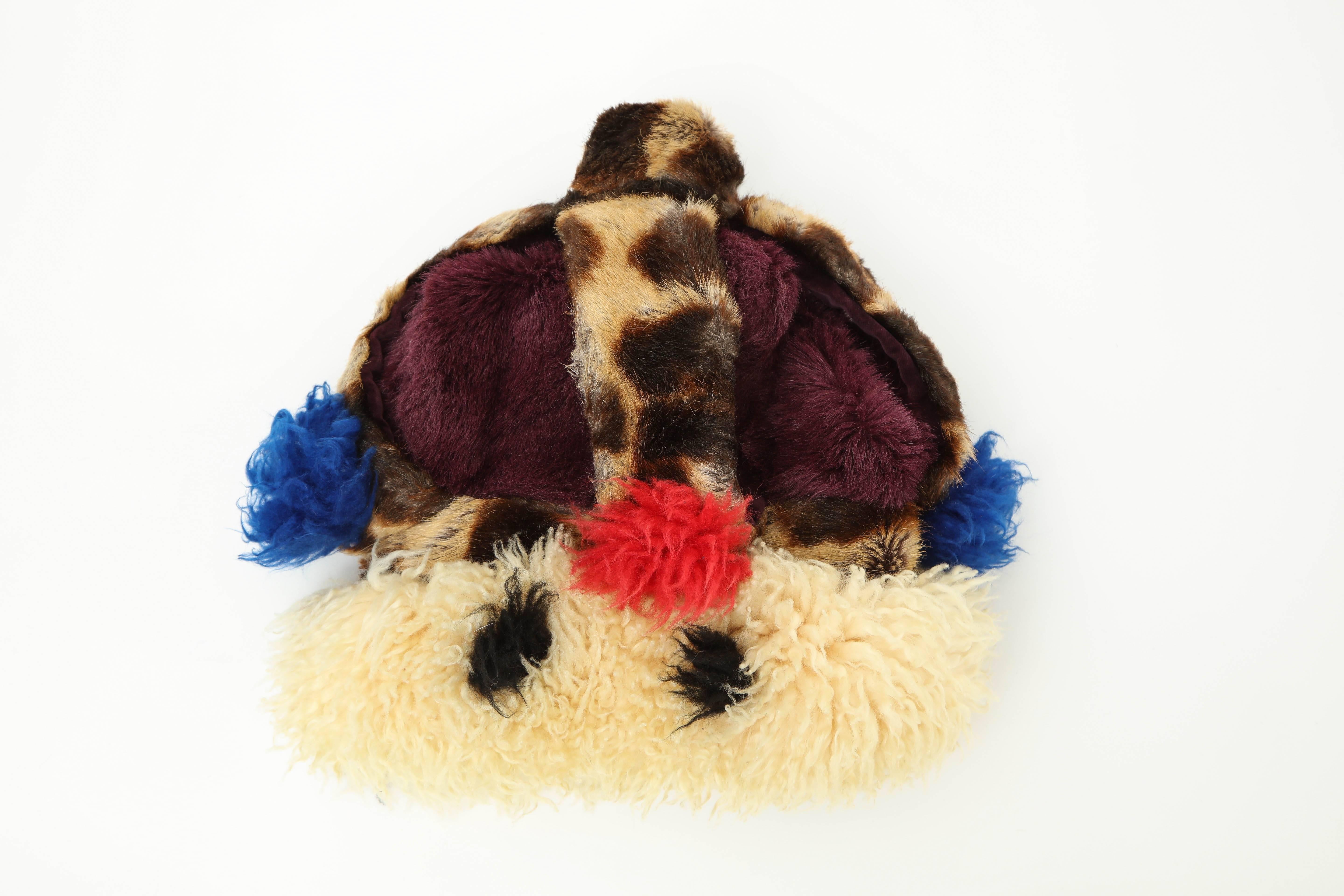 Fantastic and super rare fake fur crown by Vivienne Westwood.
This is a true Iconic piece with only a few made.
This is in excellent vintage condition.