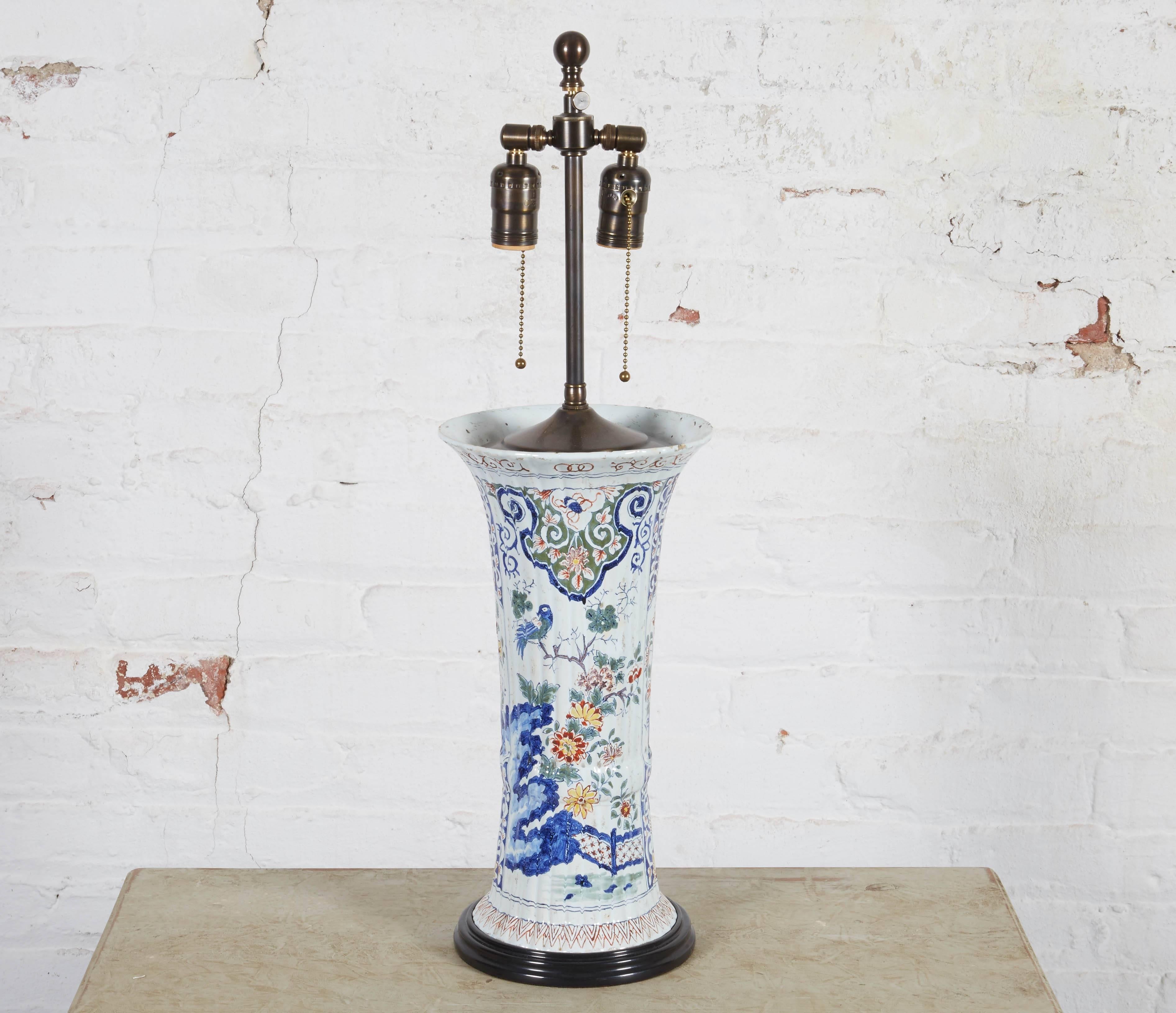 Finely decorated with birds perching in flowering trees. Height is adjustable a further 3