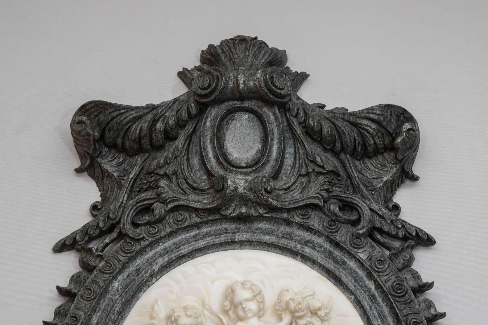 Fire-surround in marble, center medallion depicting lovers, style Napoleon III. Highly decorative.
 