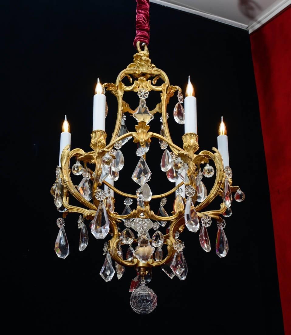 Birdcage chandelier in gold gilt bronze style Louis XV, crystal, 6 lights 19th Century.

   