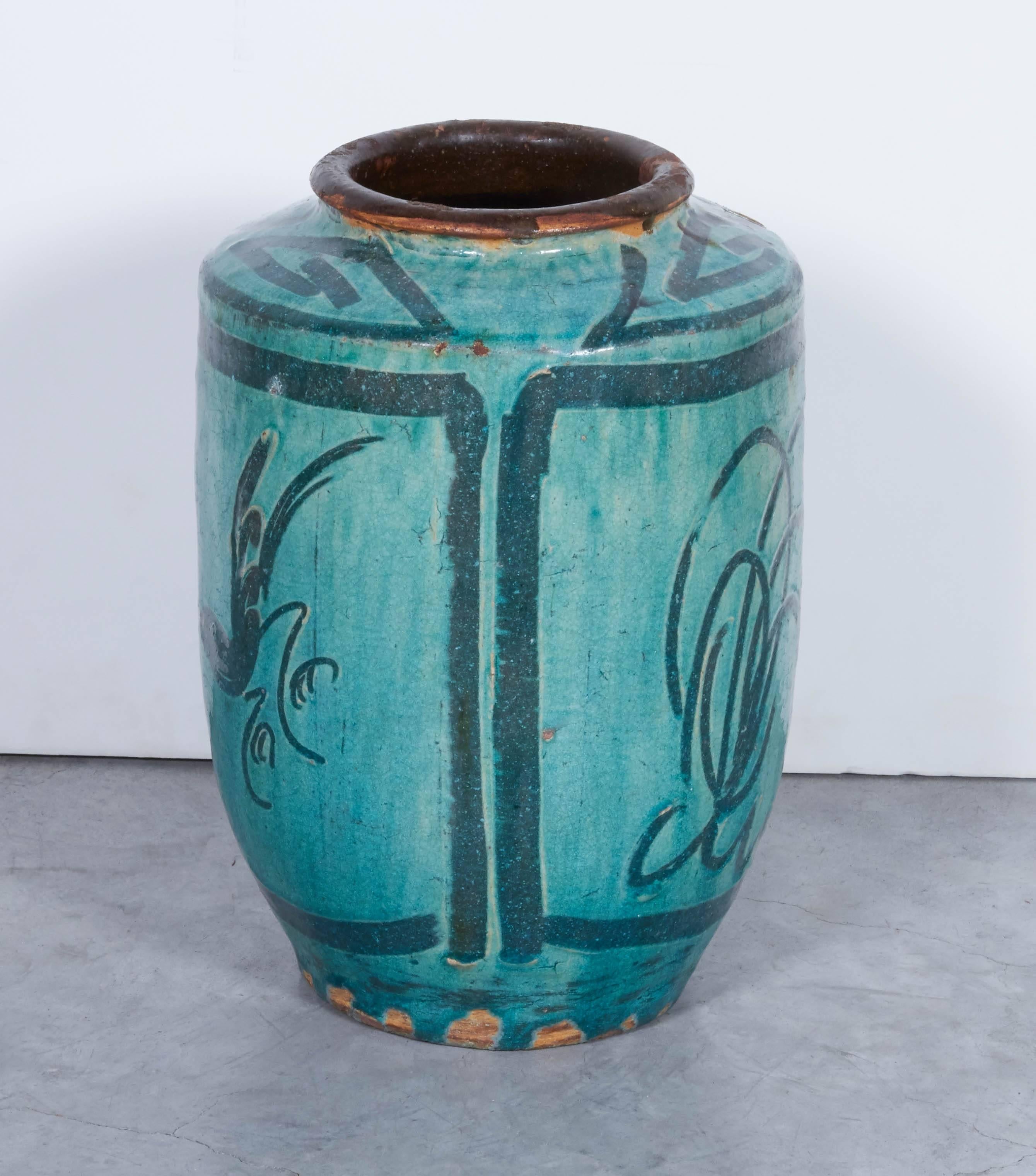 Antique Chinese ceramic food jar with beautiful hand-painted bird and flower imagery and striking blue or green glaze. From Hunan Province, circa 1850.
CR704.
a b h a y a 