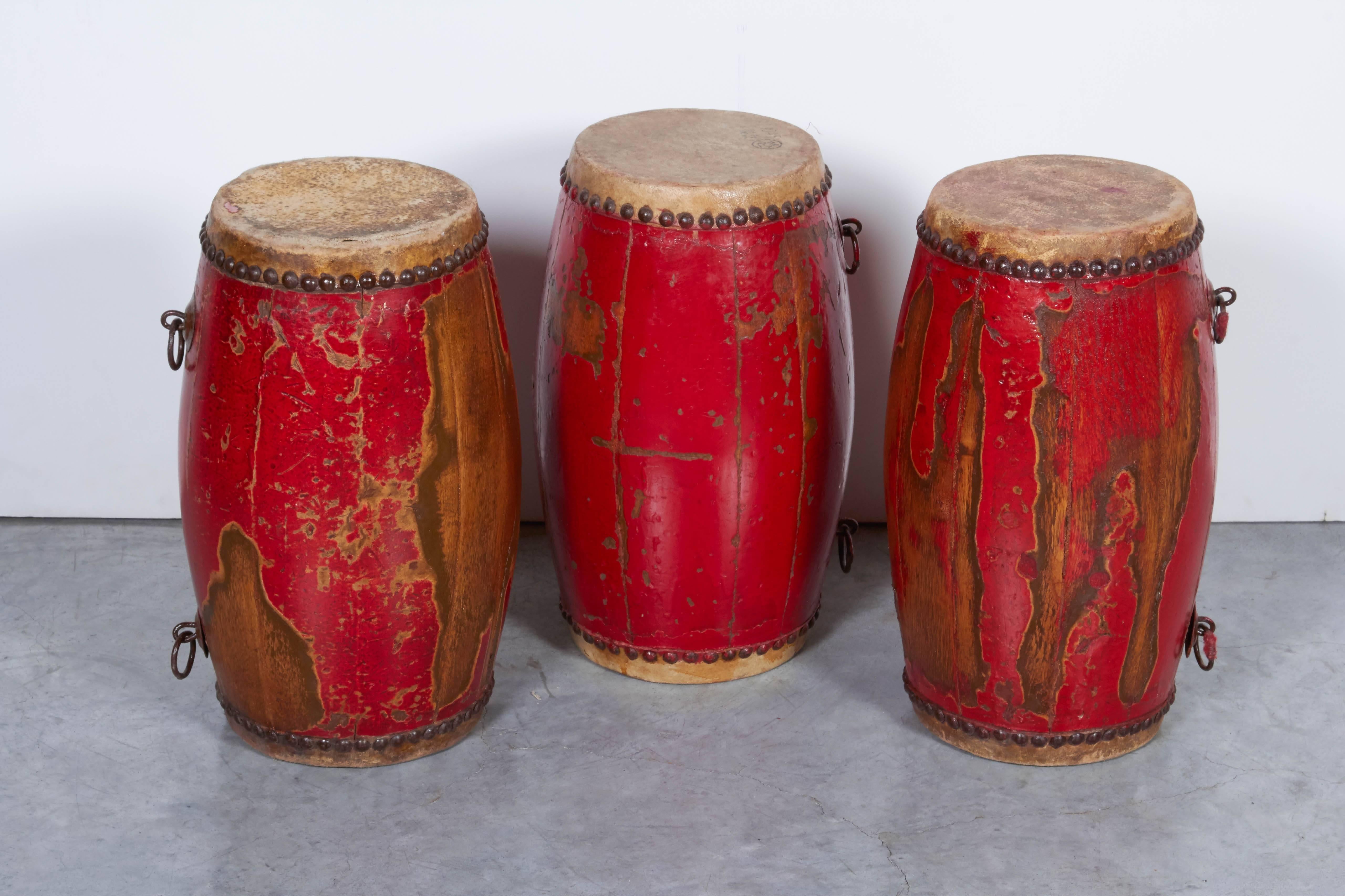 Three antique Chinese Provincial drums displaying great wear from years of use in small Provincial and military bands. Work nicely as group or individually and provide a striking splash of color. From Hebei Province.
M900.
