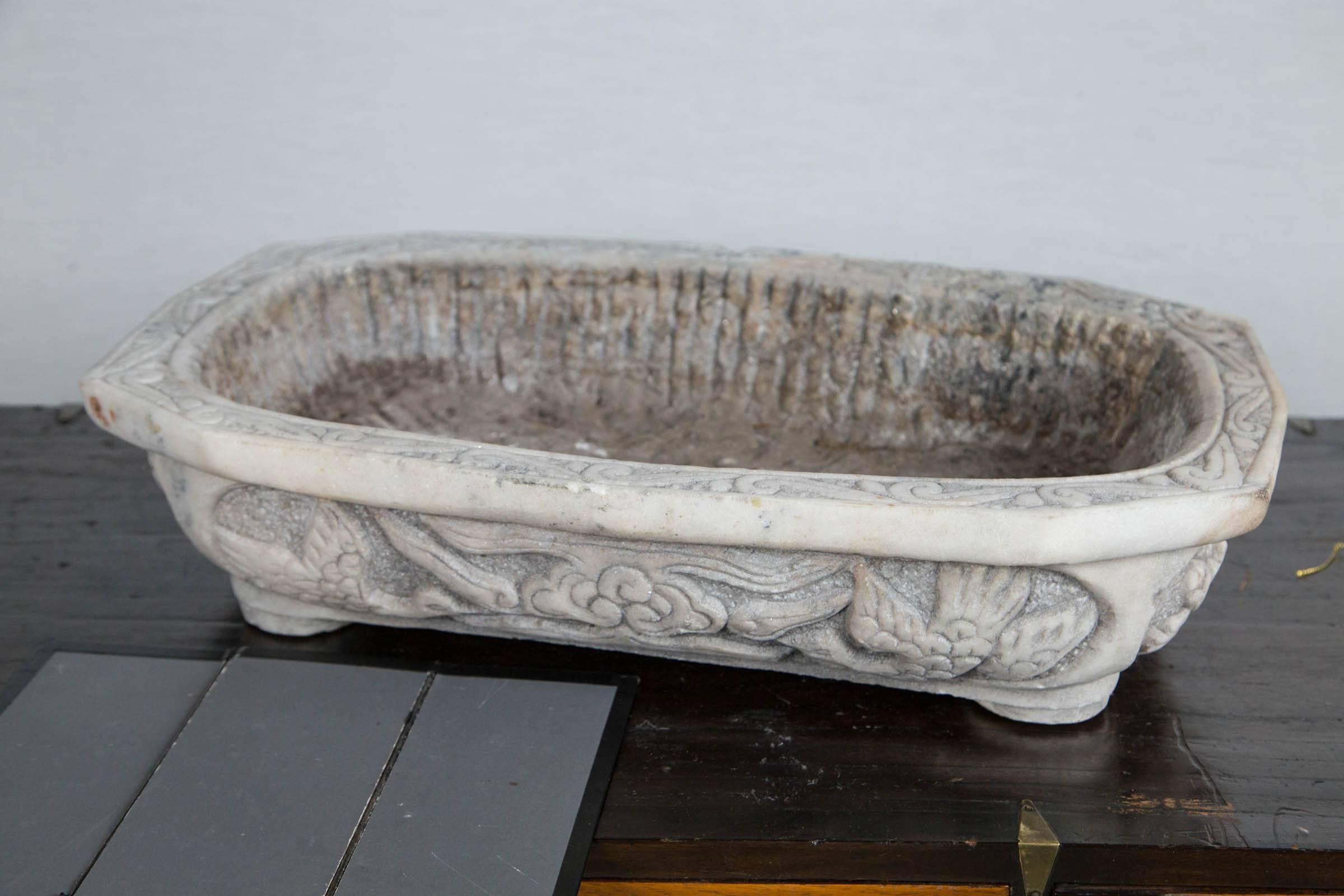Carved marble planter.
