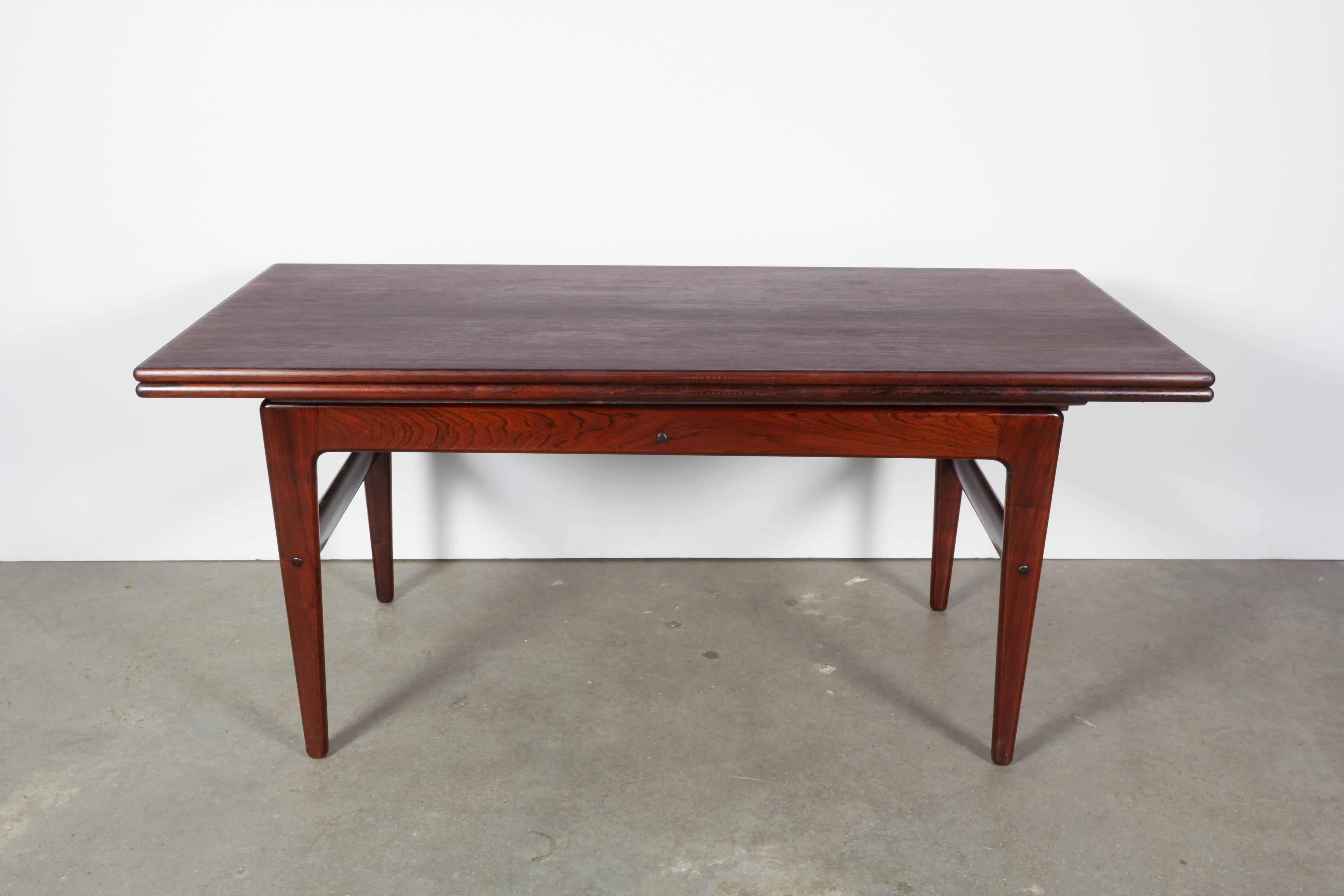 Vintage 1960s Kai Kristiansen Coffee Table / Dining Table

This mid century adjustable table is in excellent condition and transforms into a dining table. The mechanism is simple and easy to use and the leaves just pull out. The height of the dining
